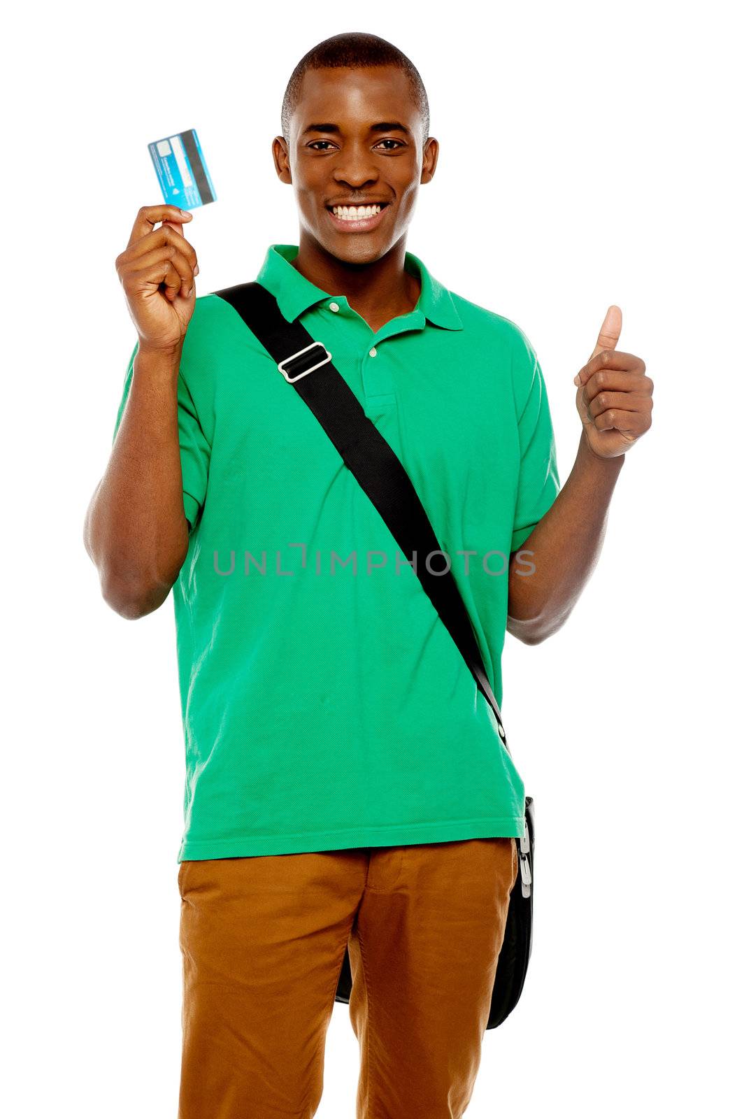Smiling african student showing credit card to camera and with thumbs up gesture