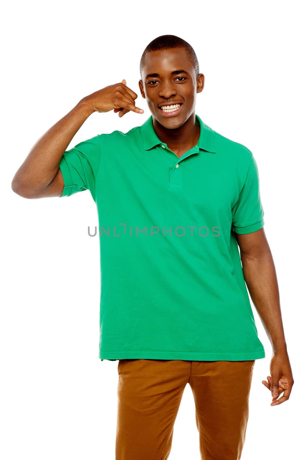Happy young man with calling gesture over white background