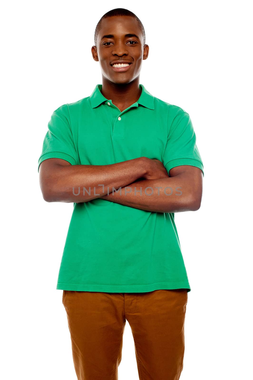 Smiling african guy with crossed arms against white background