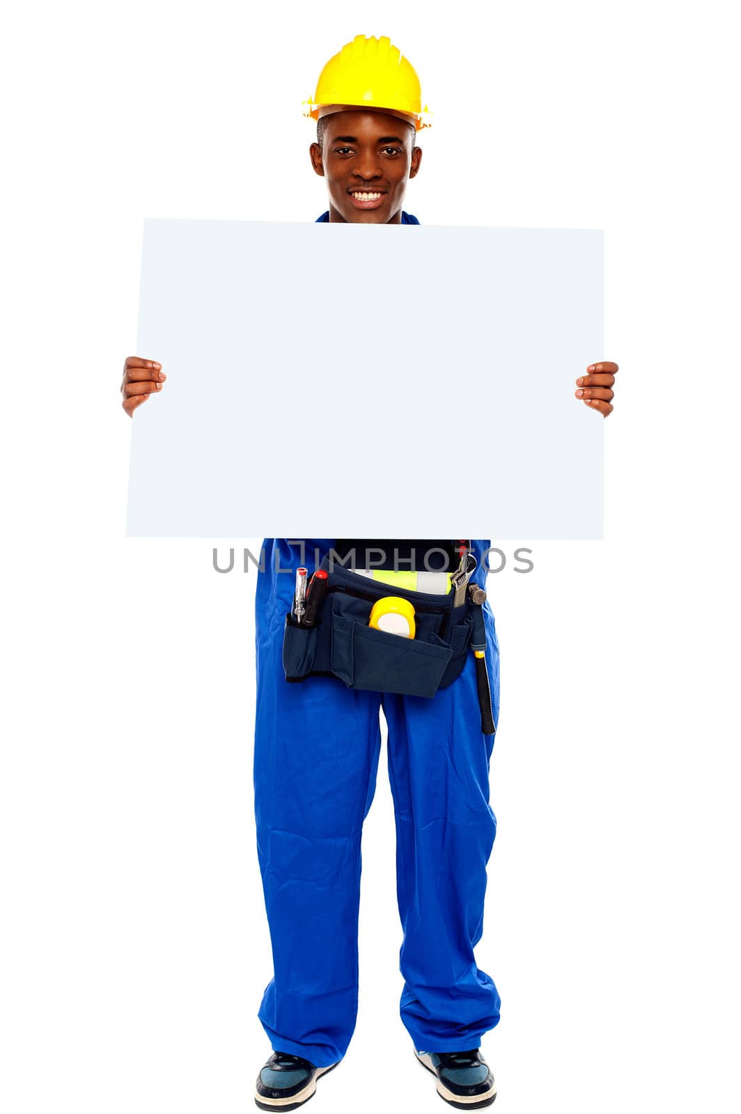 African contractor showing blank billboard, full length shot