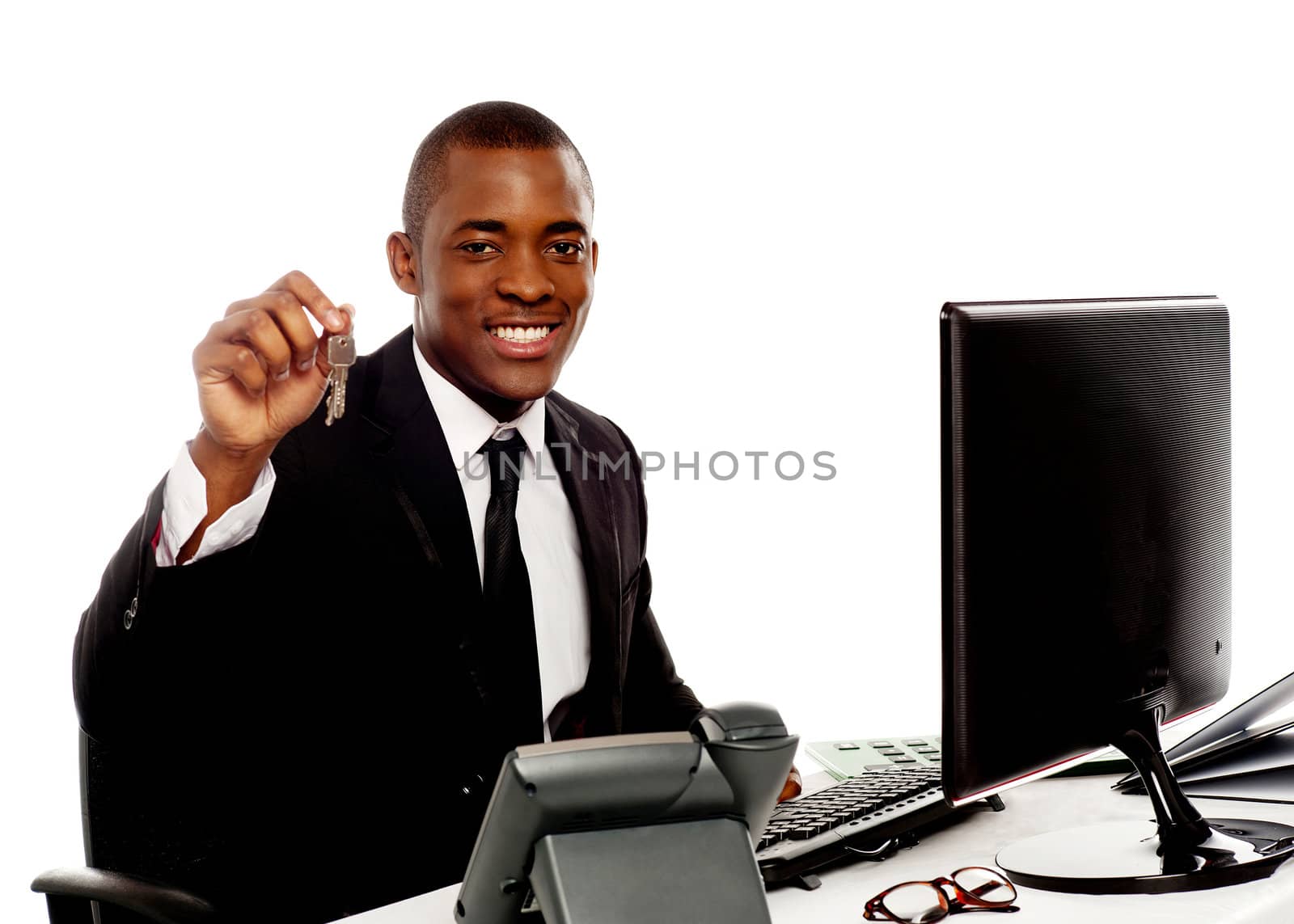 Manager showing office keys to camera isolated against white background