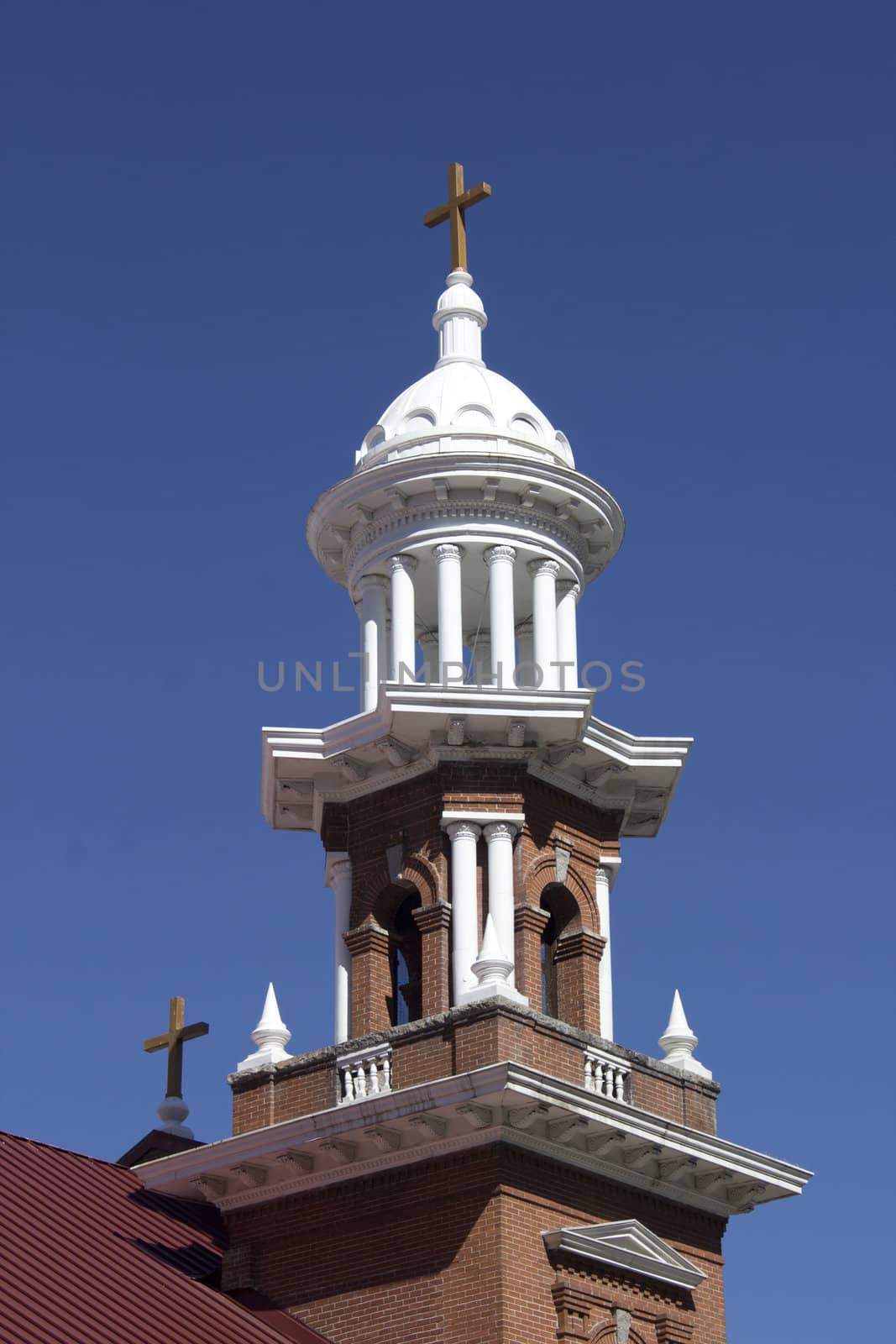 A vintage old church with blue skies