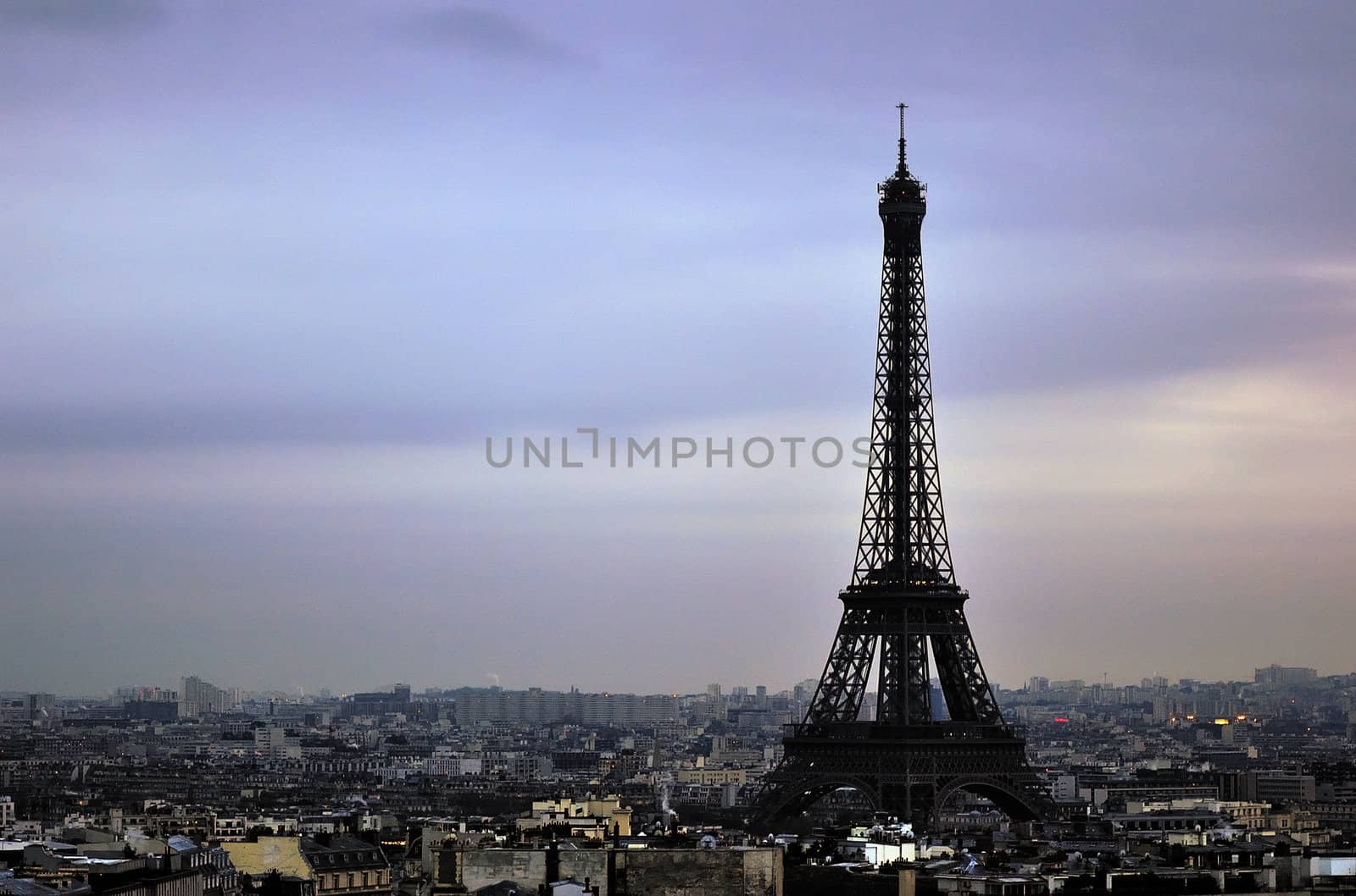 France Eiffel Tower. View of Paris during sunset.
