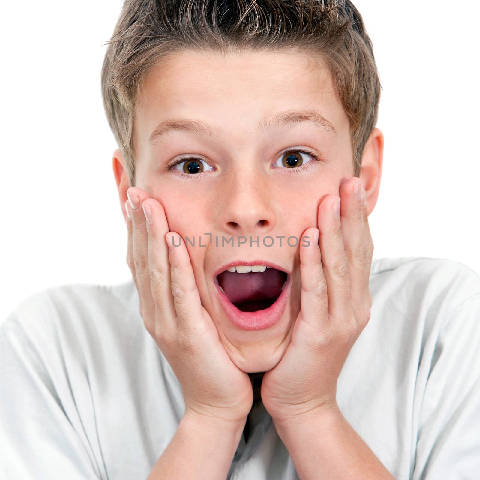 Close up portrait of boy with surprising face expression.Isolated on white.