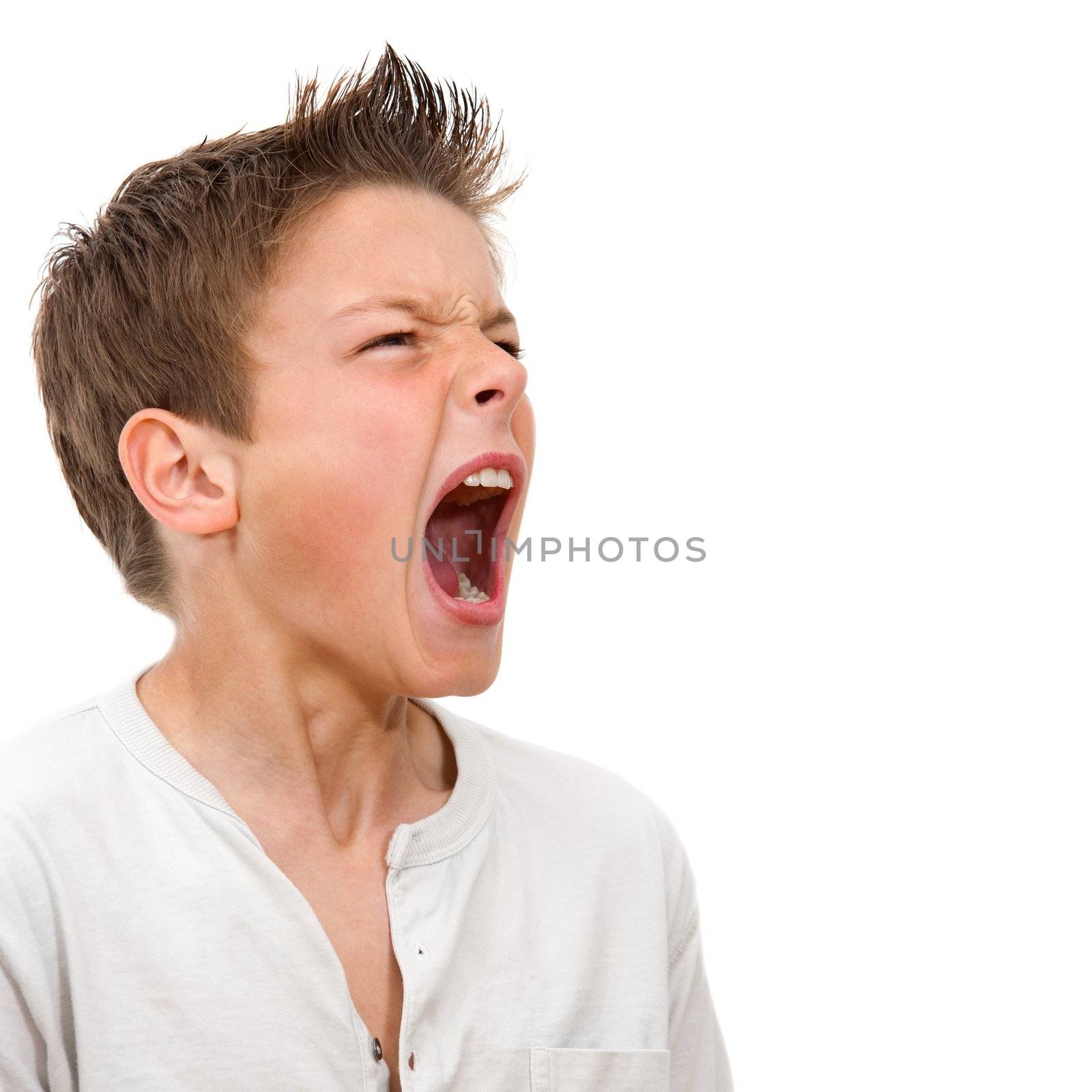 Close up portrait of boy shouting by karelnoppe