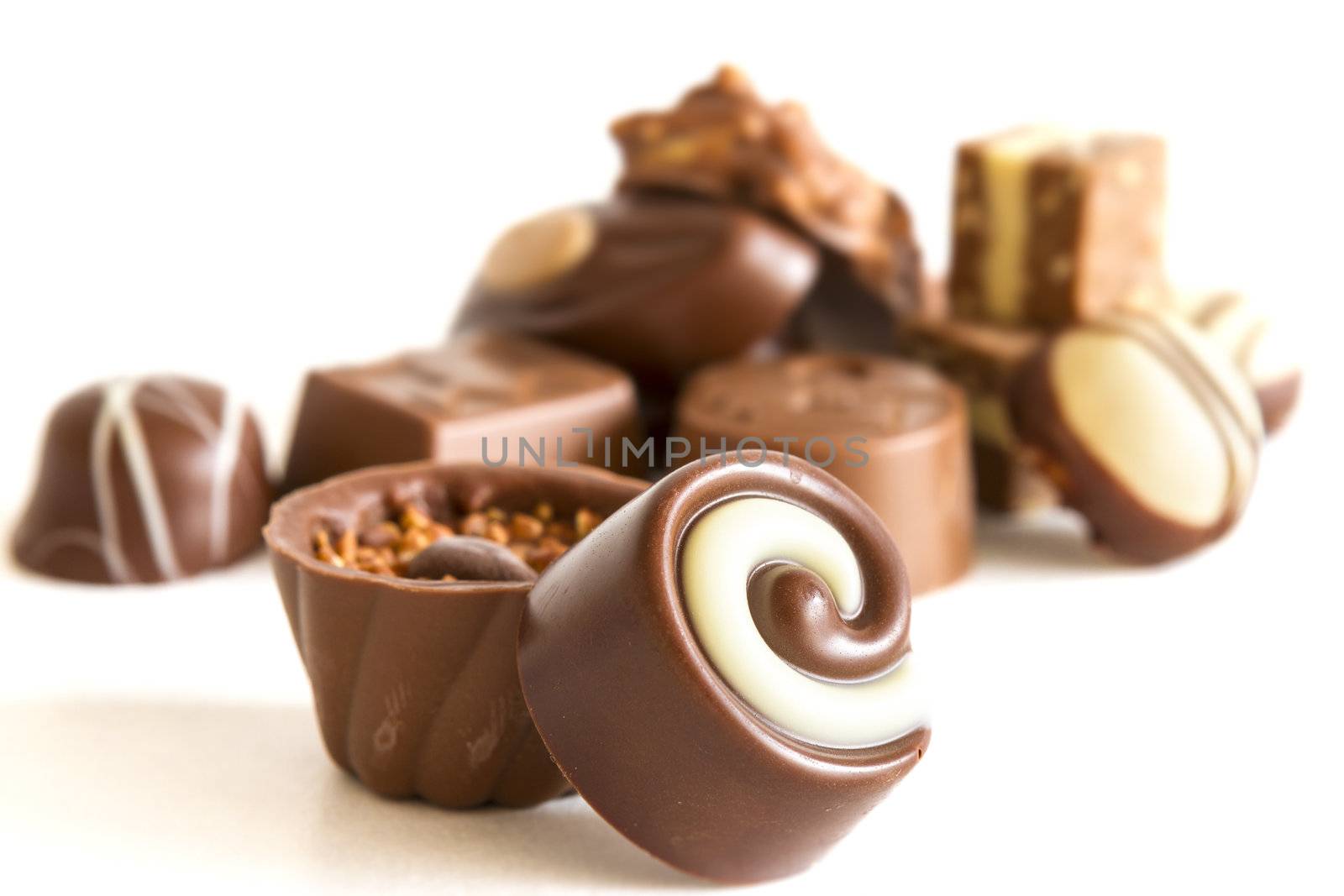 Chocolate candys and truffles on white background