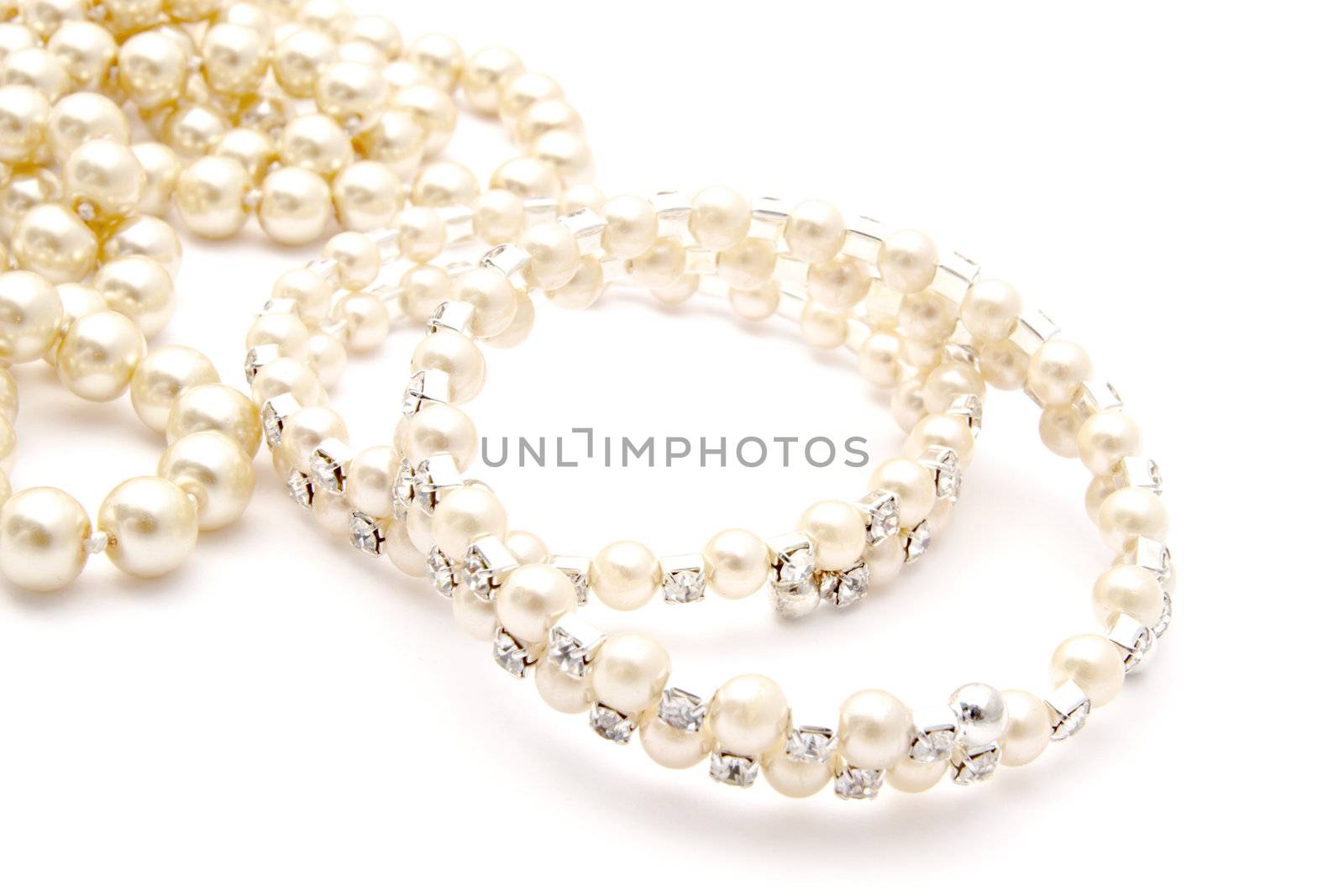 Beautiful Bracelet and necklace isolated on white background 