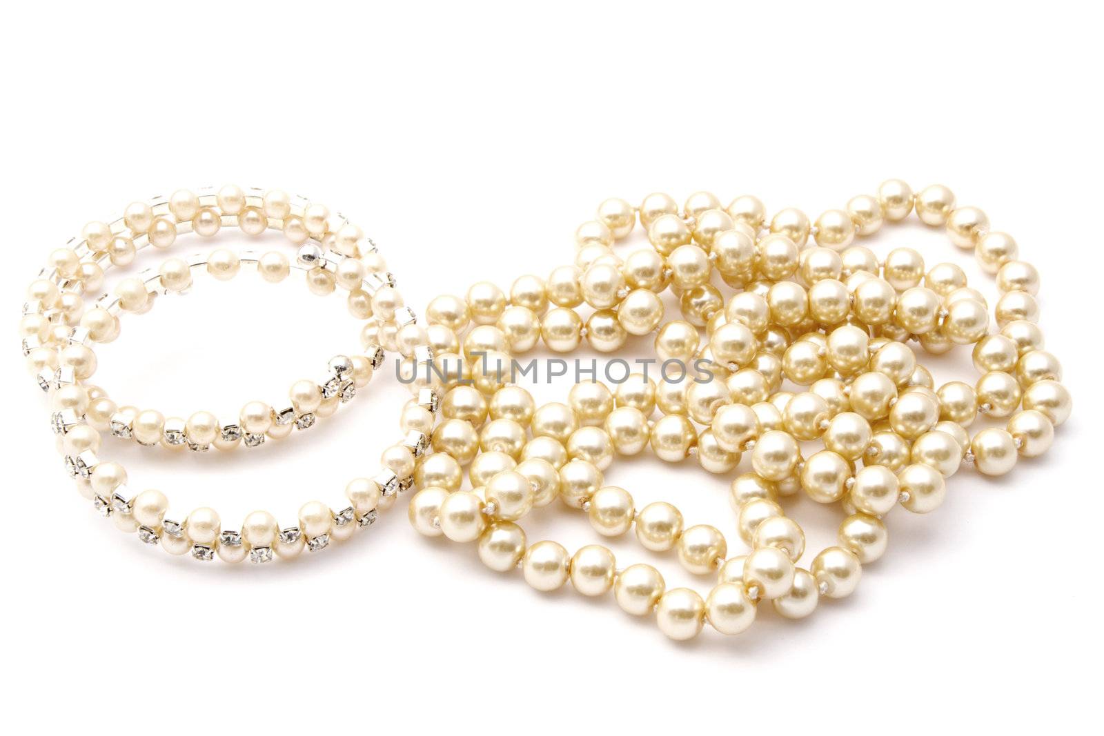 Beautiful Bracelet and necklace isolated on white background 