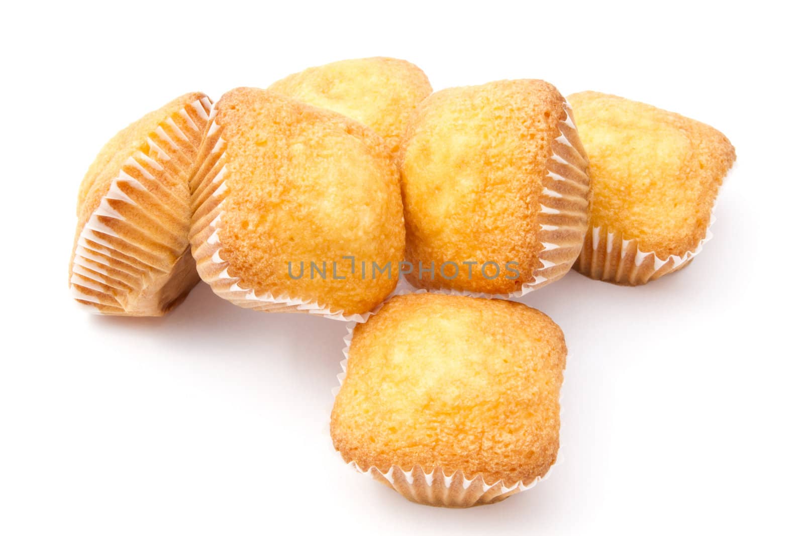 Delicious muffins isolated on white background