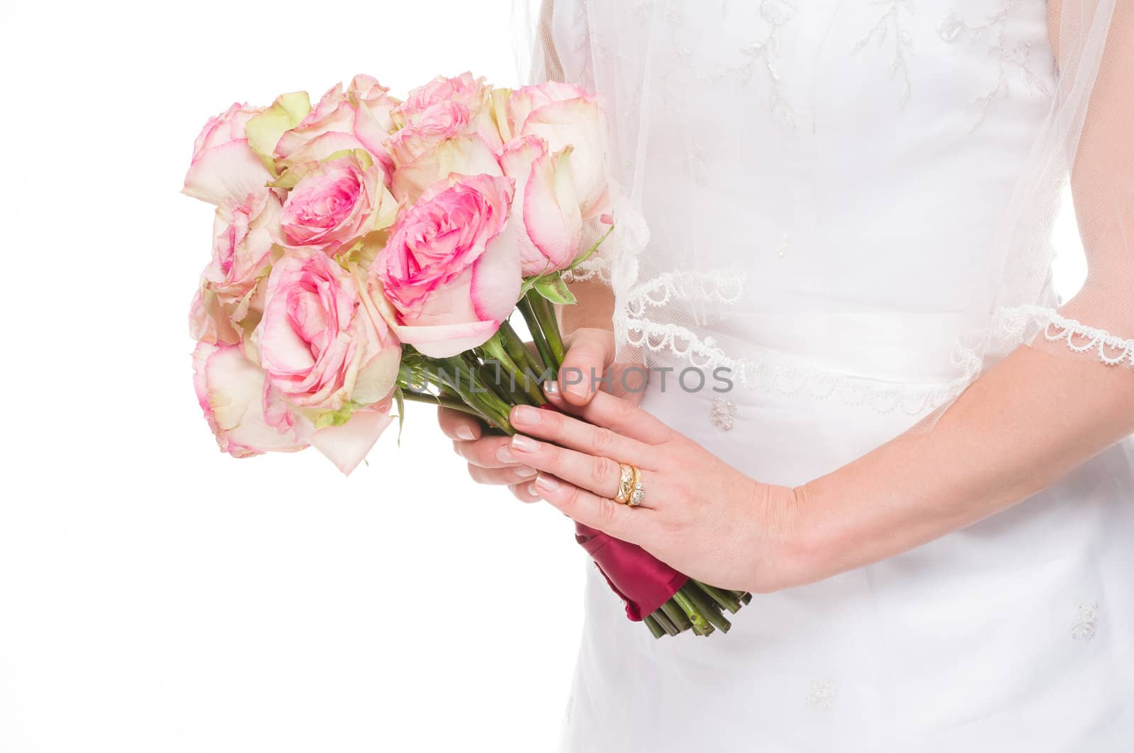 Young bride holding a bouquet on isolated white background with gold wedding ring.