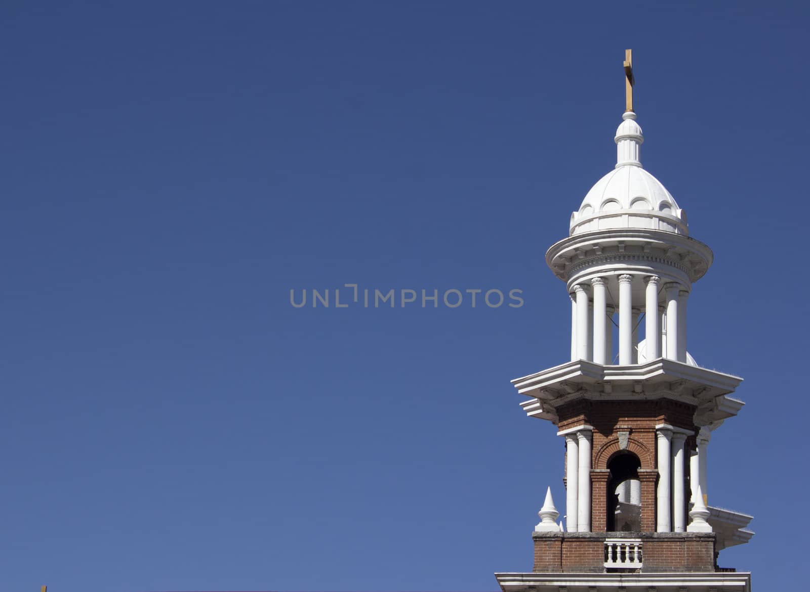 A vintage old church with blue skies