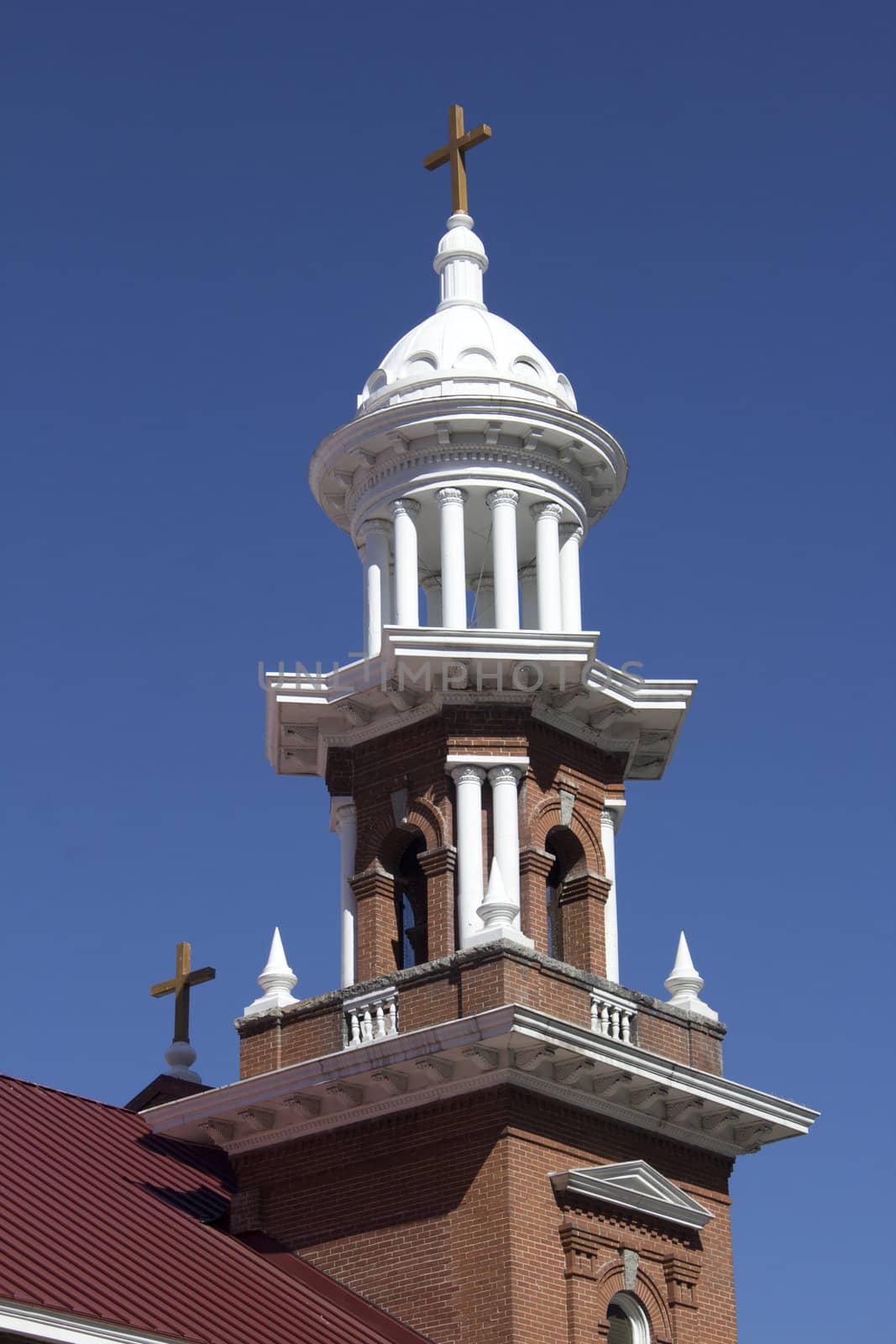 A vintage old church with blue skies