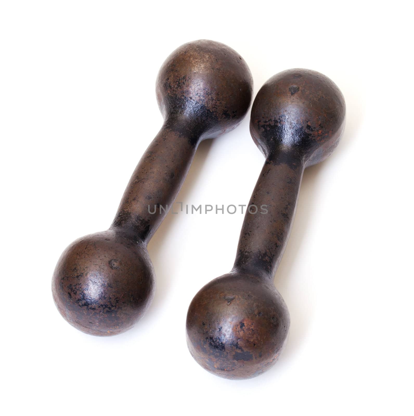 Old Rusty Dumbbells on white background