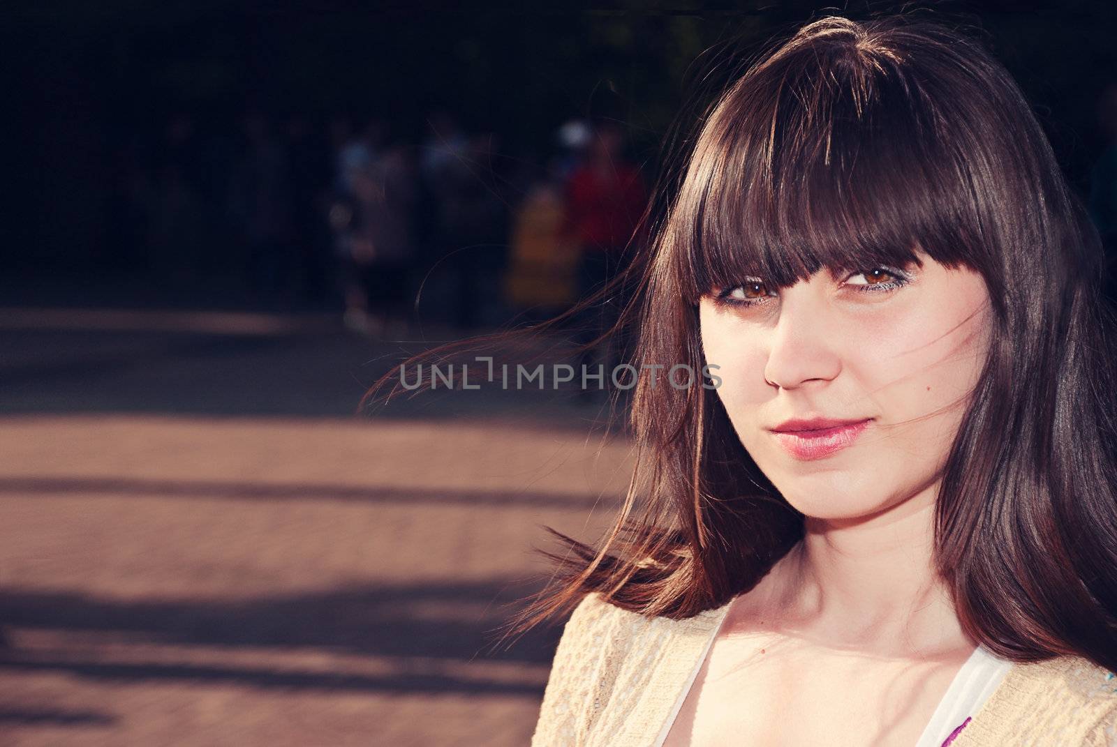 Beautiful portrait of an adorable woman in outdoors.