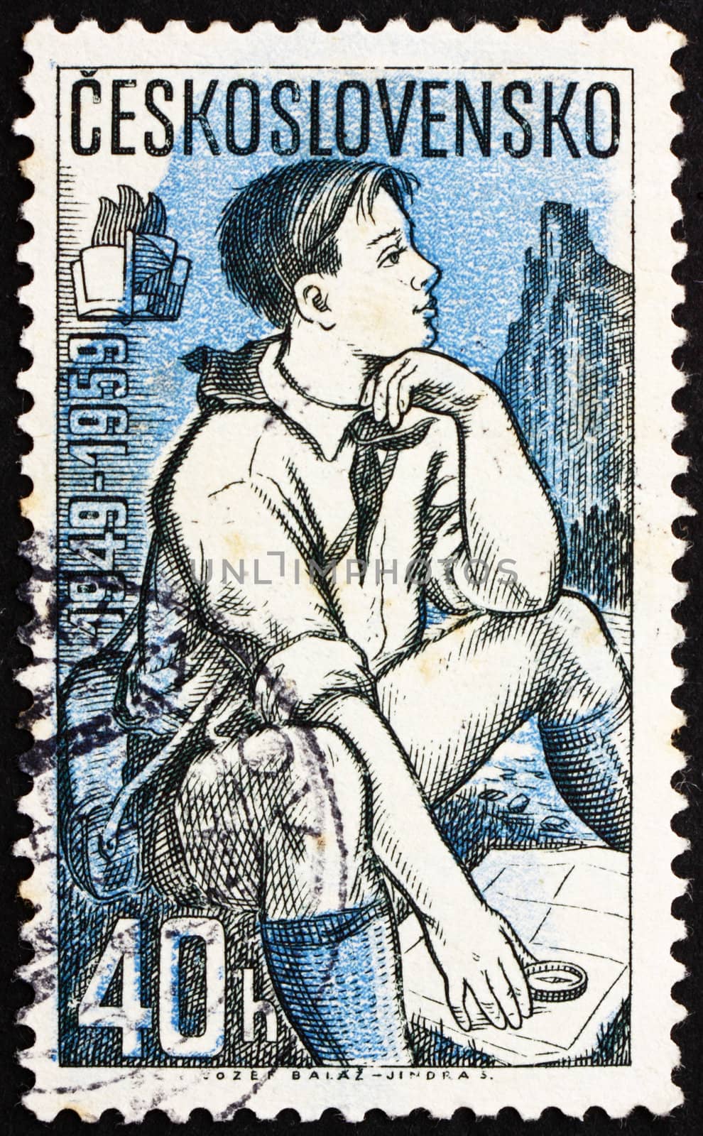 CZECHOSLOVAKIA - CIRCA 1959: a stamp printed in the Czechoslovakia shows Pioneer Studying Map, circa 1959