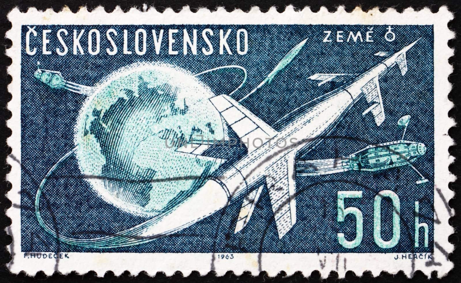 CZECHOSLOVAKIA - CIRCA 1963: a stamp printed in the Czechoslovakia shows Rockets and Sputniks Leaving Earth,  circa 1963