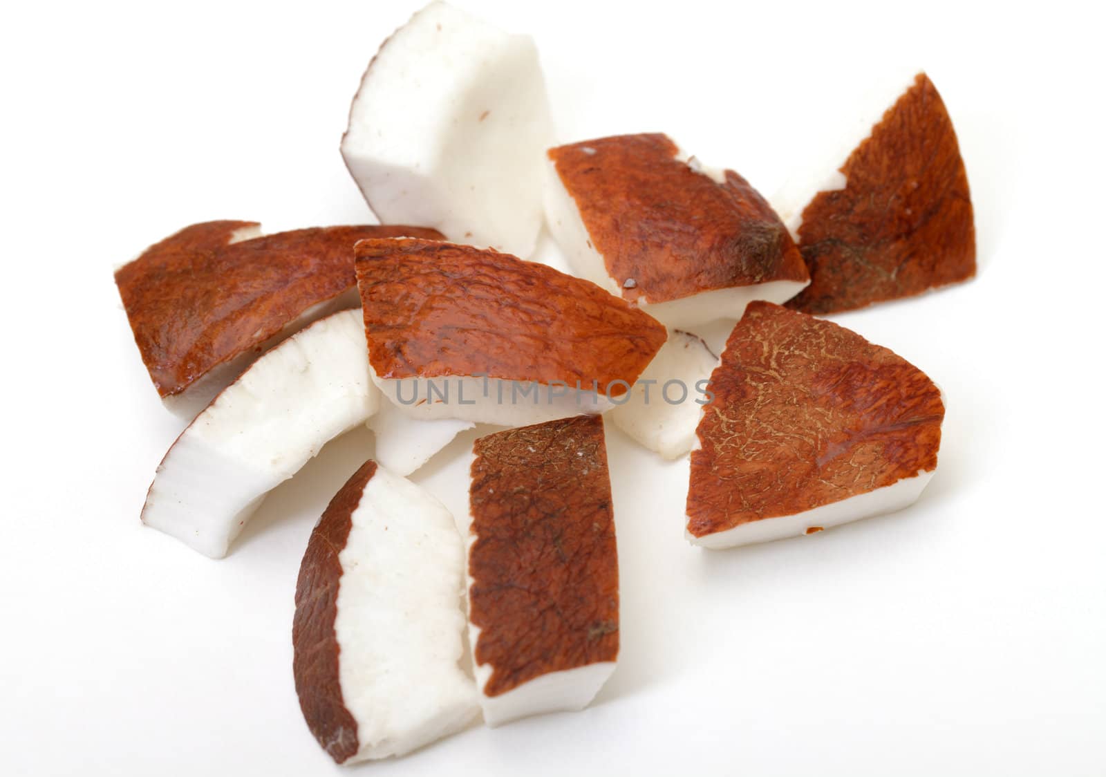 Pieces of coconut ob white background