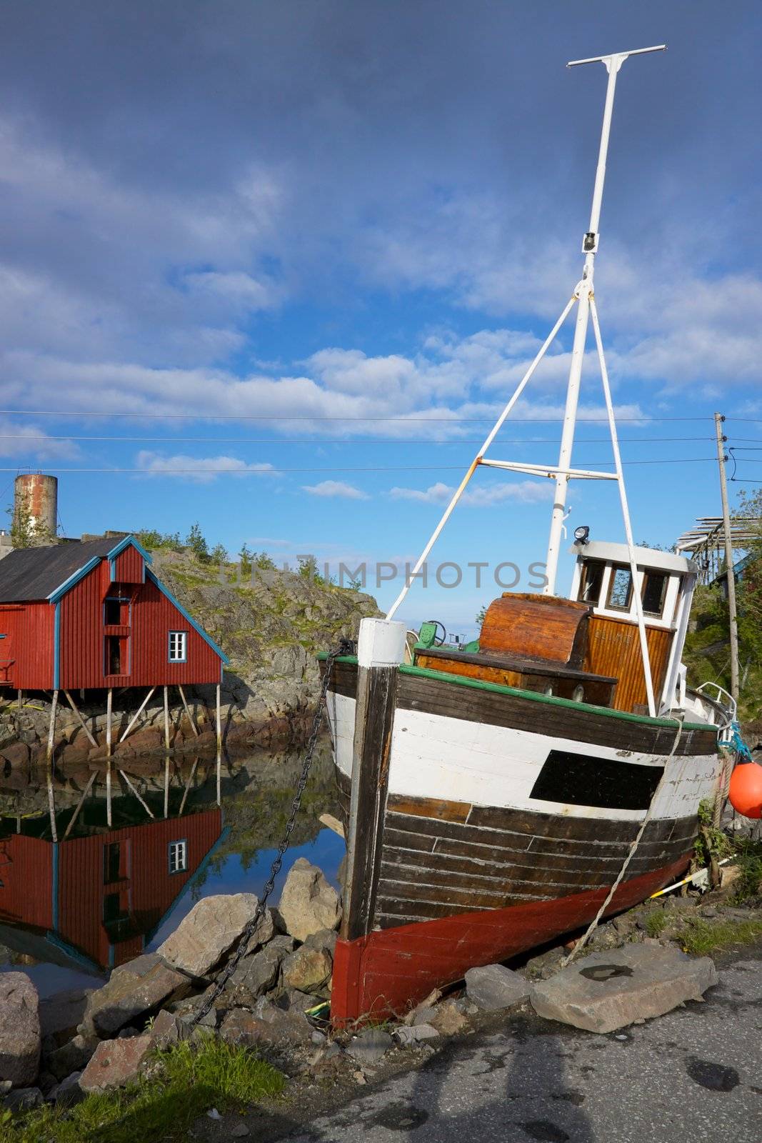 Fishing boat in village on Lofoten islands in Norway