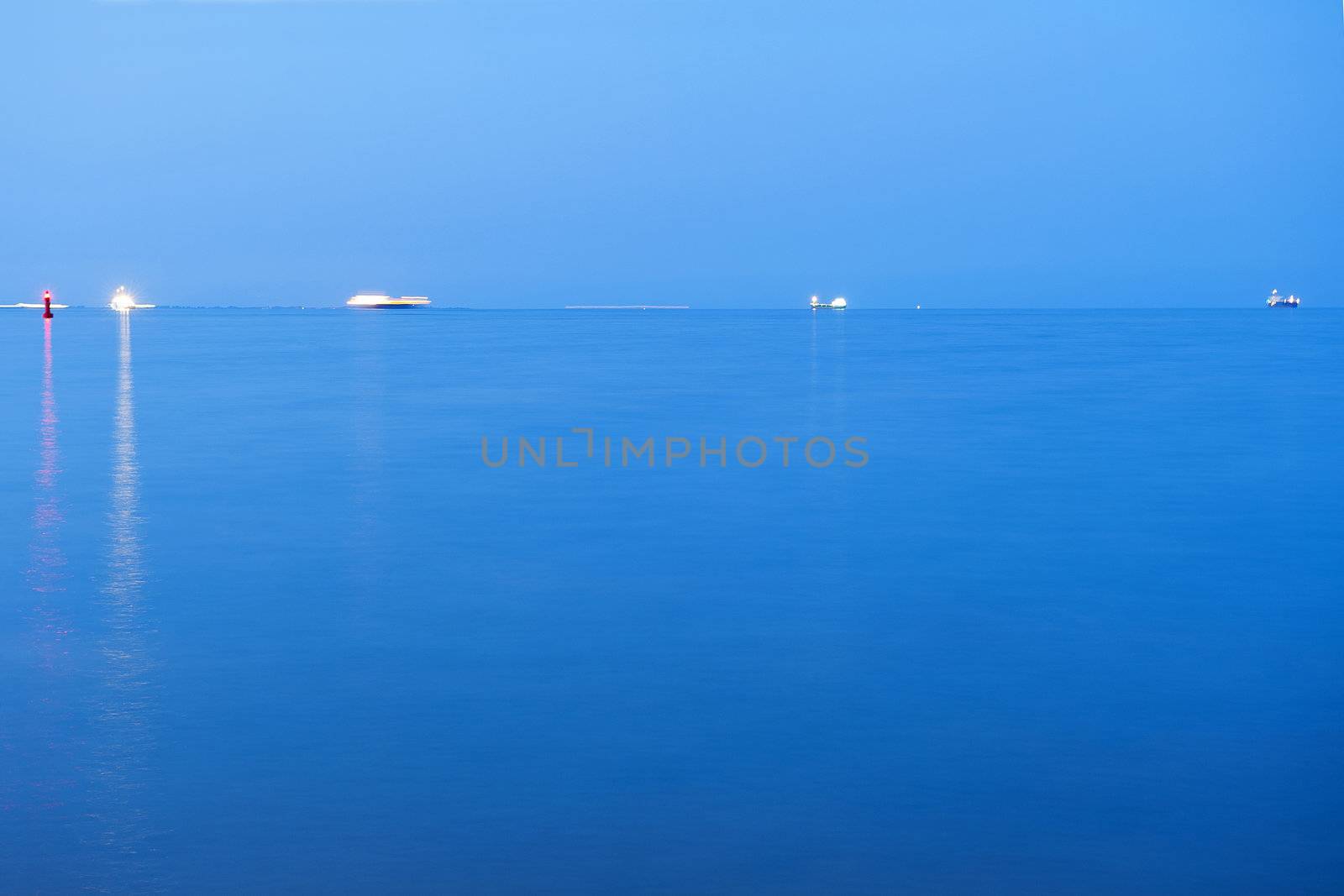 Ships floating on the blue water