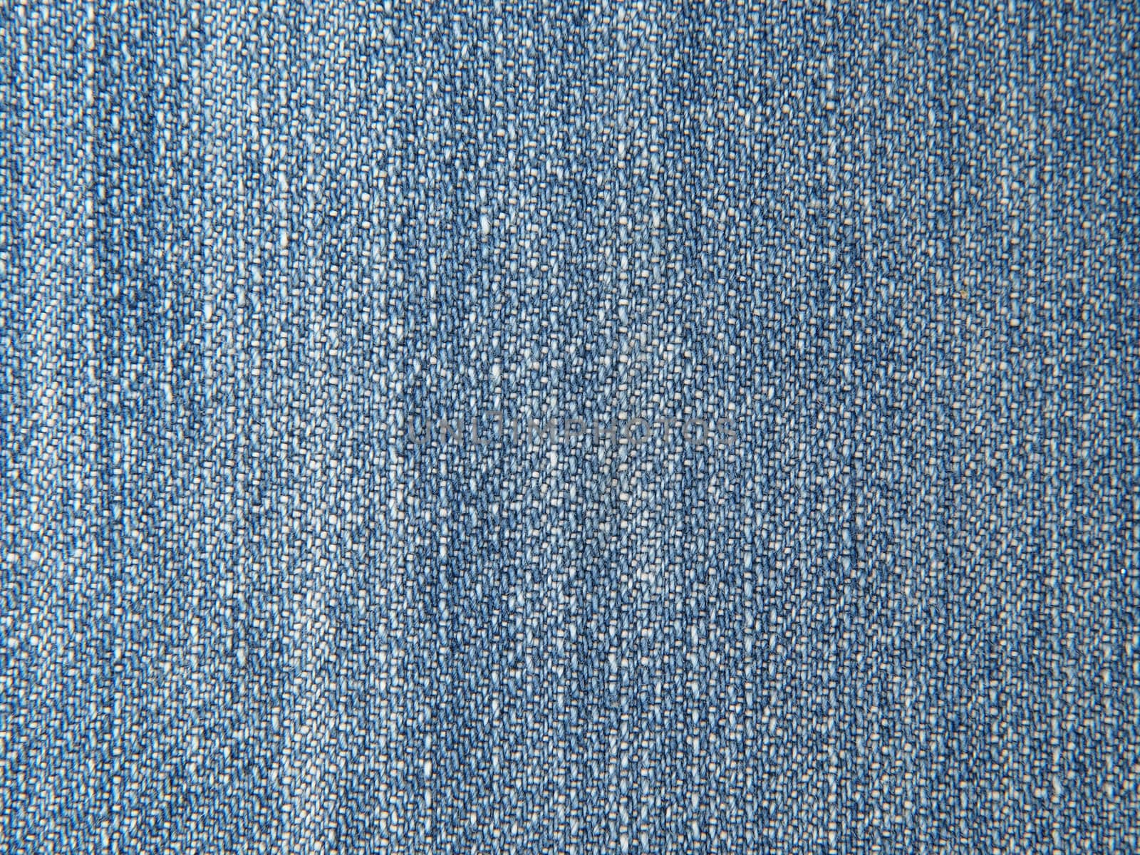 Blue fabric texture pattern as background.