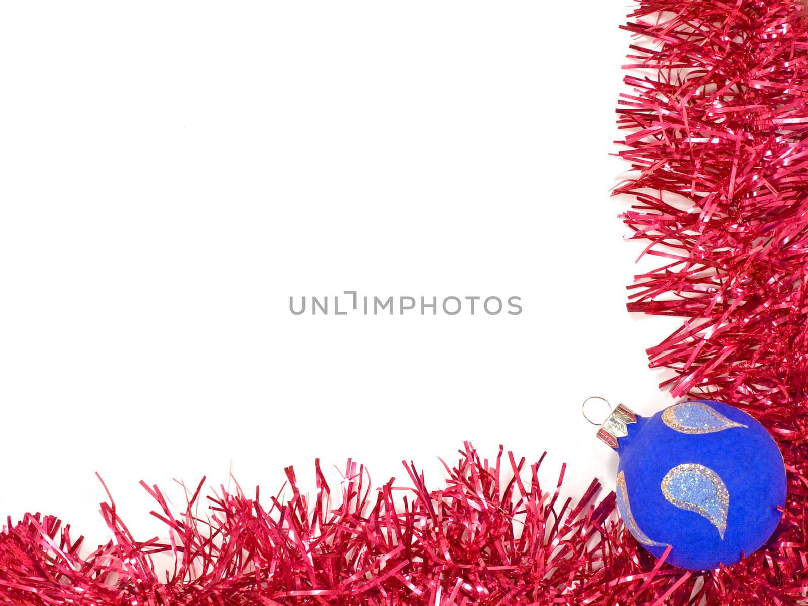 Blue christmas ball and red decoration on white background.