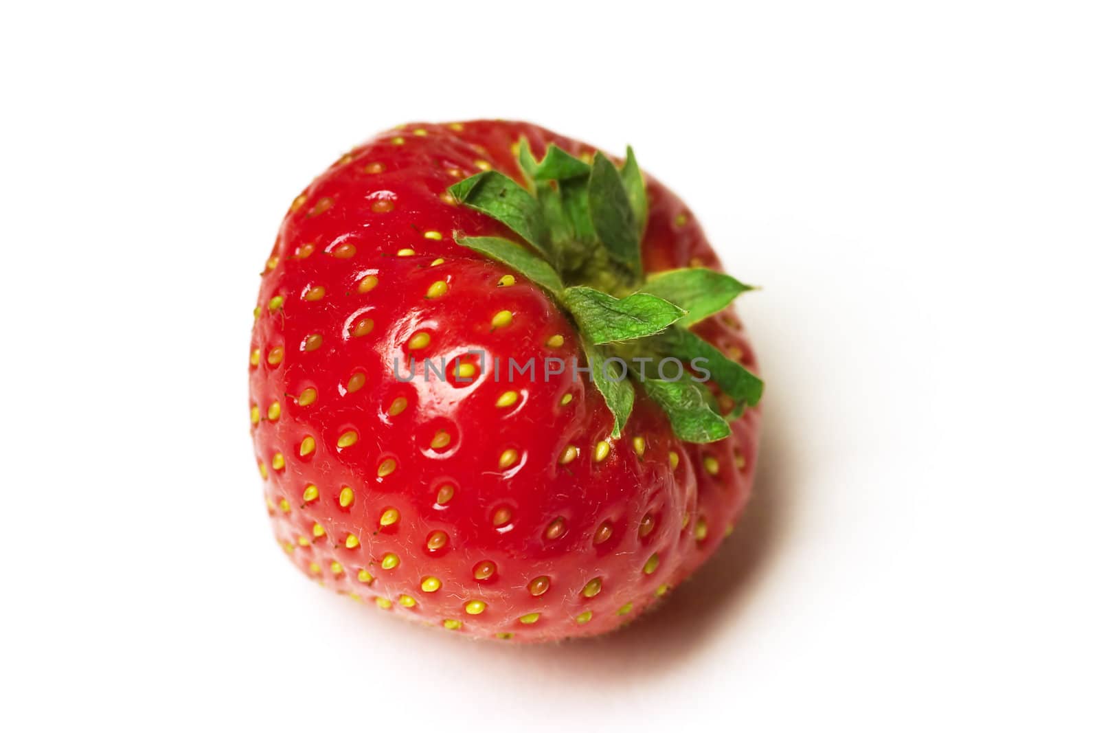 excellent brightly red strawberry on a white background