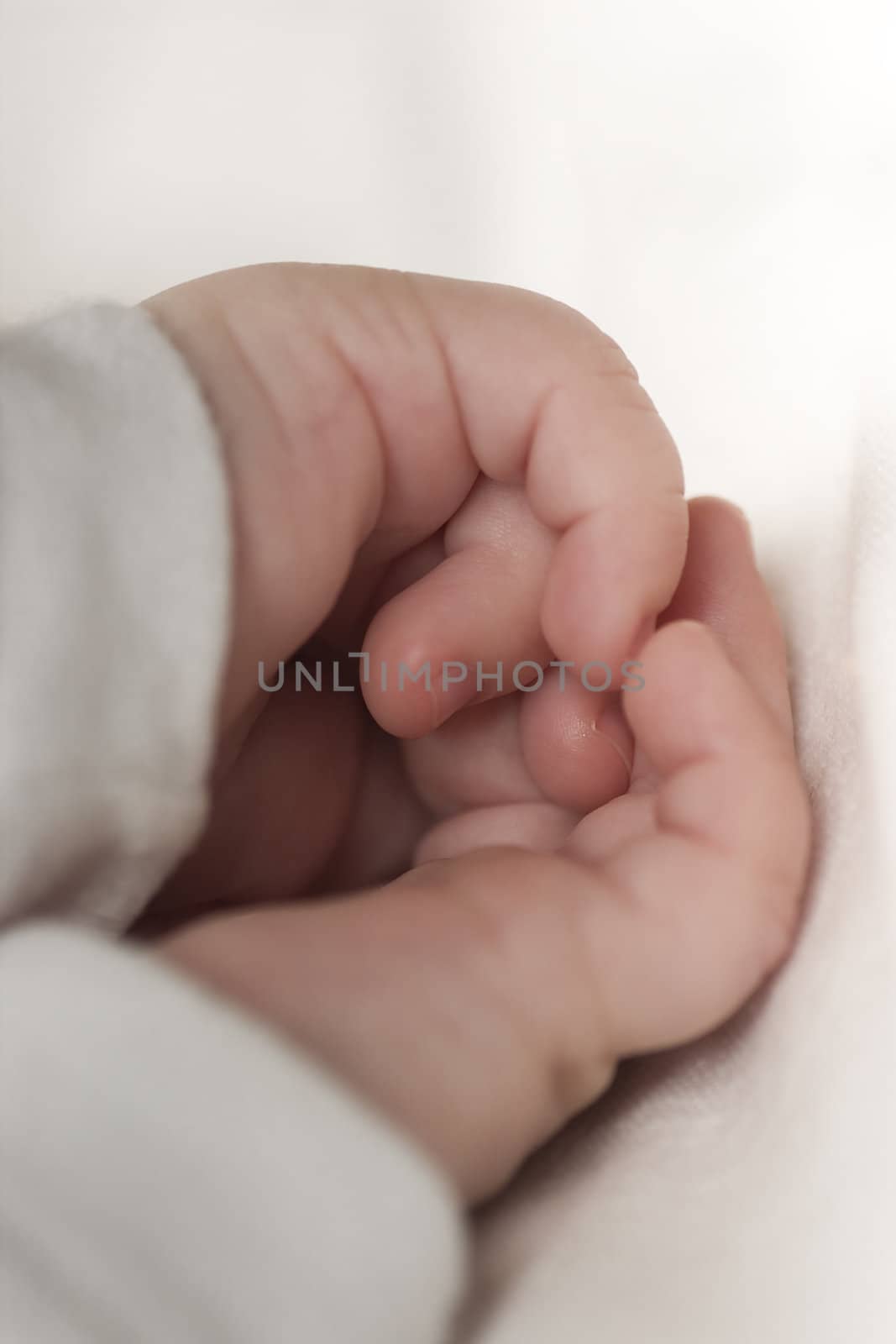 small hands of the sleeping baby by Serp