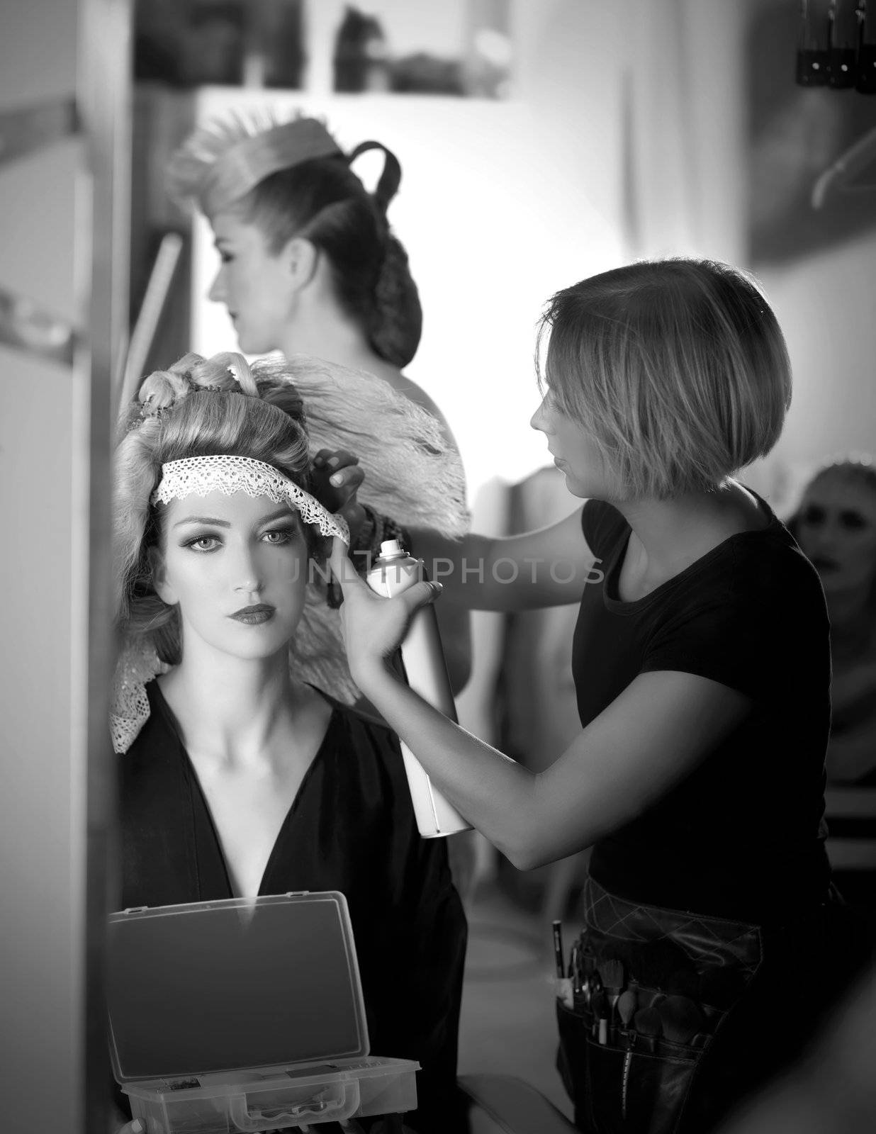 backstage hairdressing and makeup fashion with make-up artist
