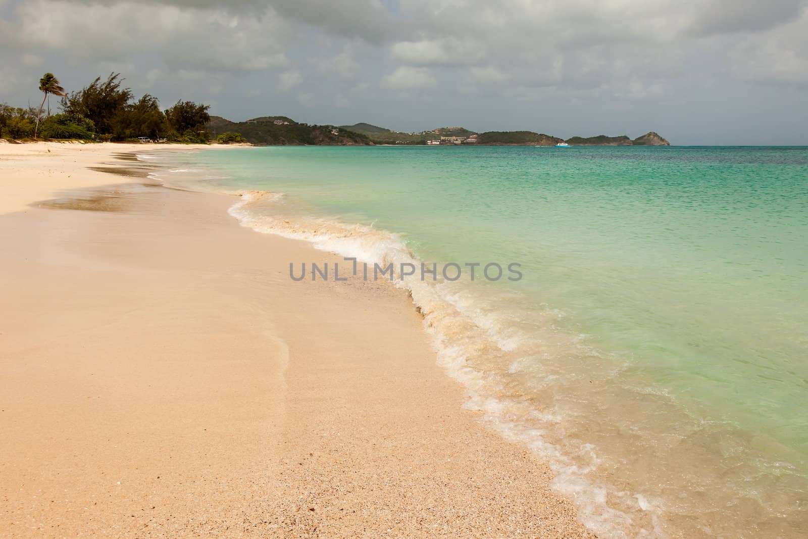 Tropical Sandy Caribbean Beach with Cloudy Overcast Sky  by scheriton