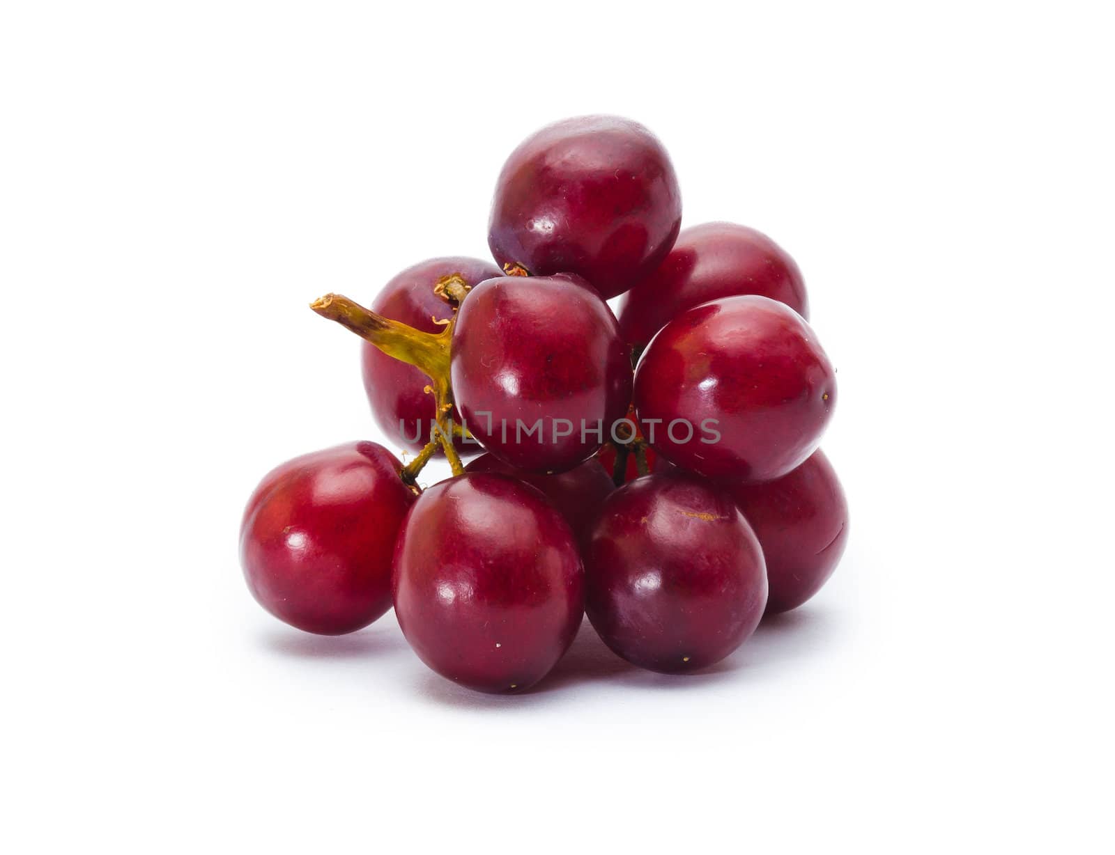 red grape isolated on white by heinteh