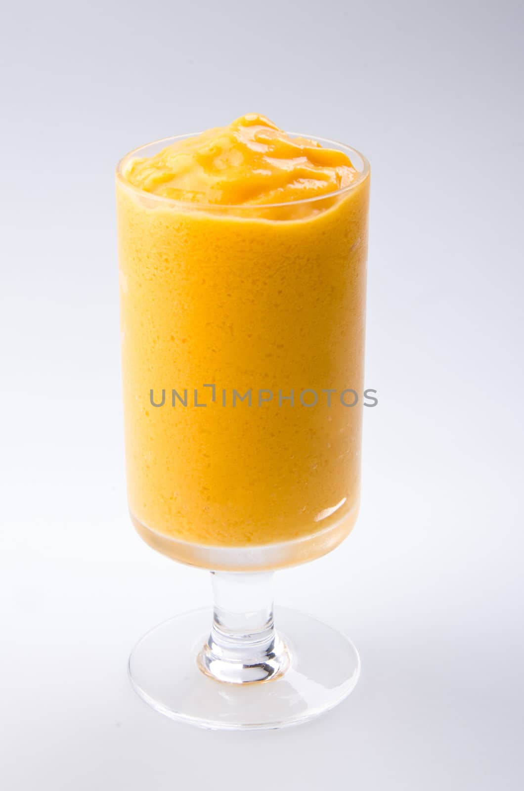 mango yogurt, milk shake isolated on white by heinteh