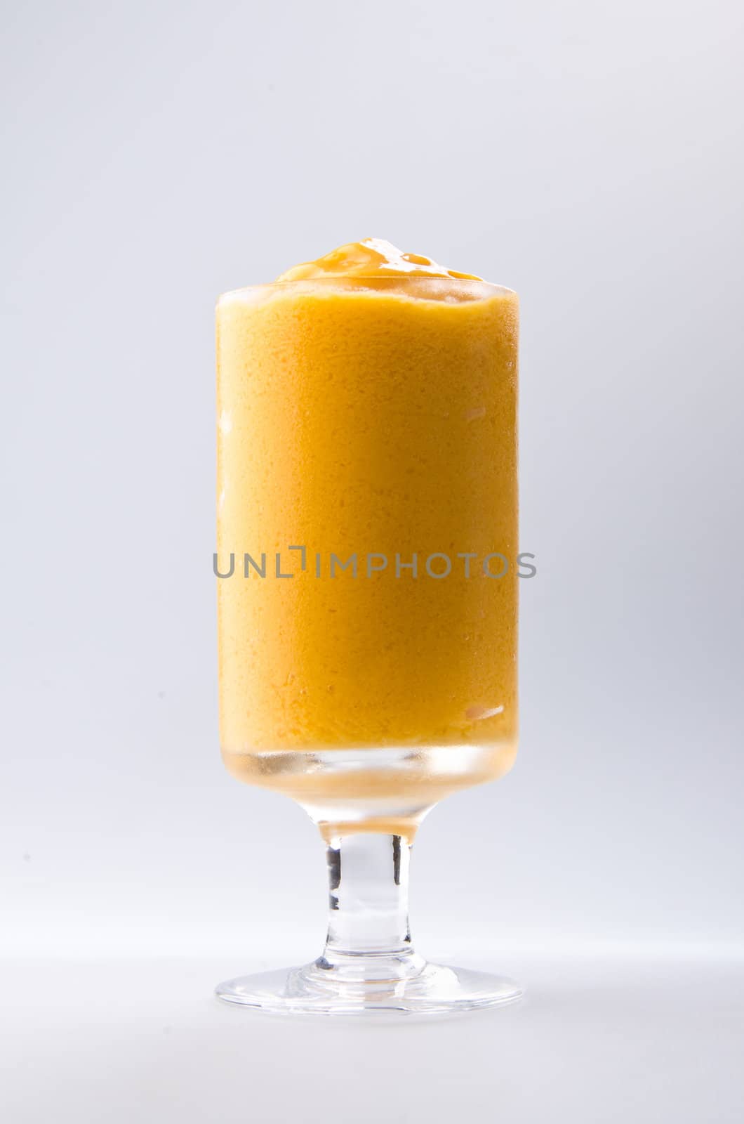 mango yogurt, milk shake isolated on white by heinteh