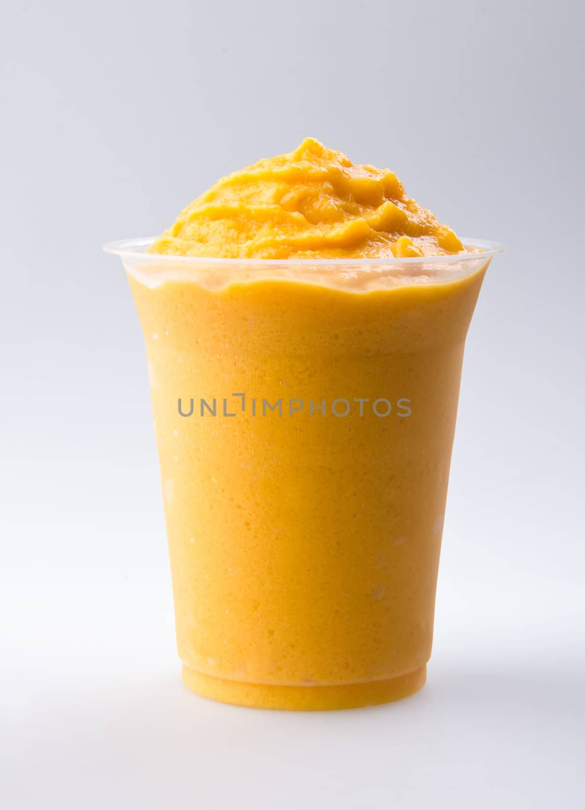 mango yogurt, milk shake isolated on white by heinteh