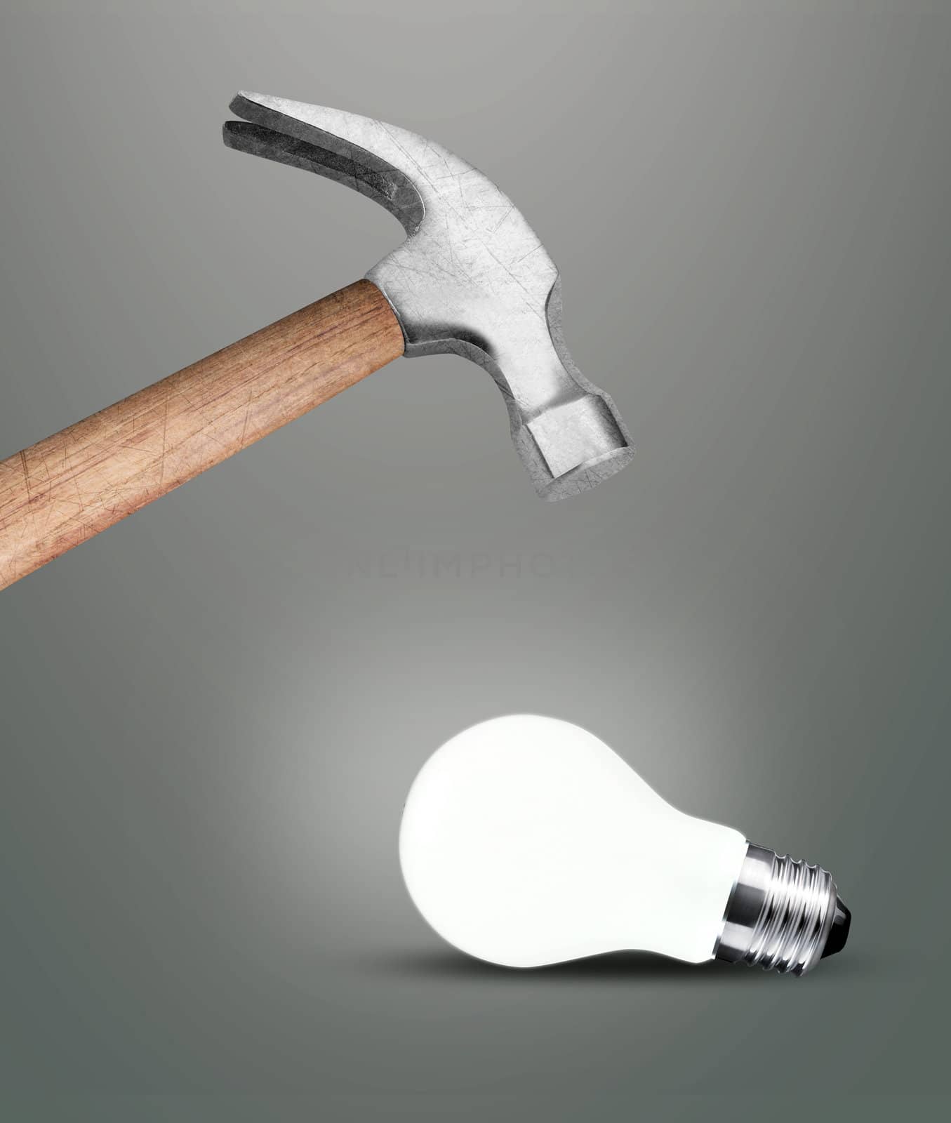 Hammer hitting a lightbulb .