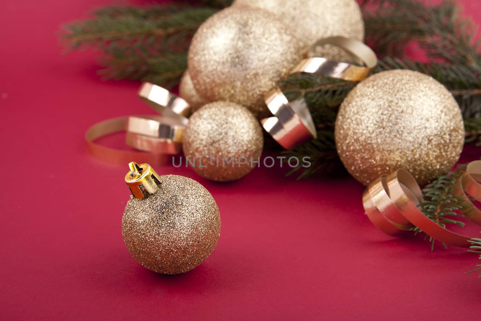 beautiful golden christmas decoration on red background sparkle