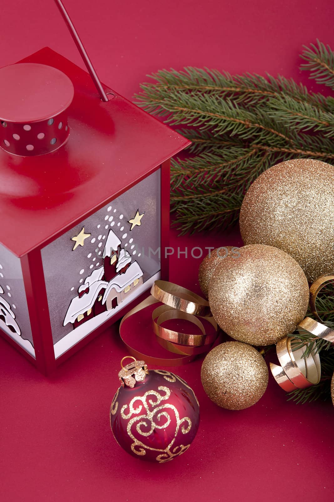 beautiful christmas decoration in gold and red color with tree and lamp