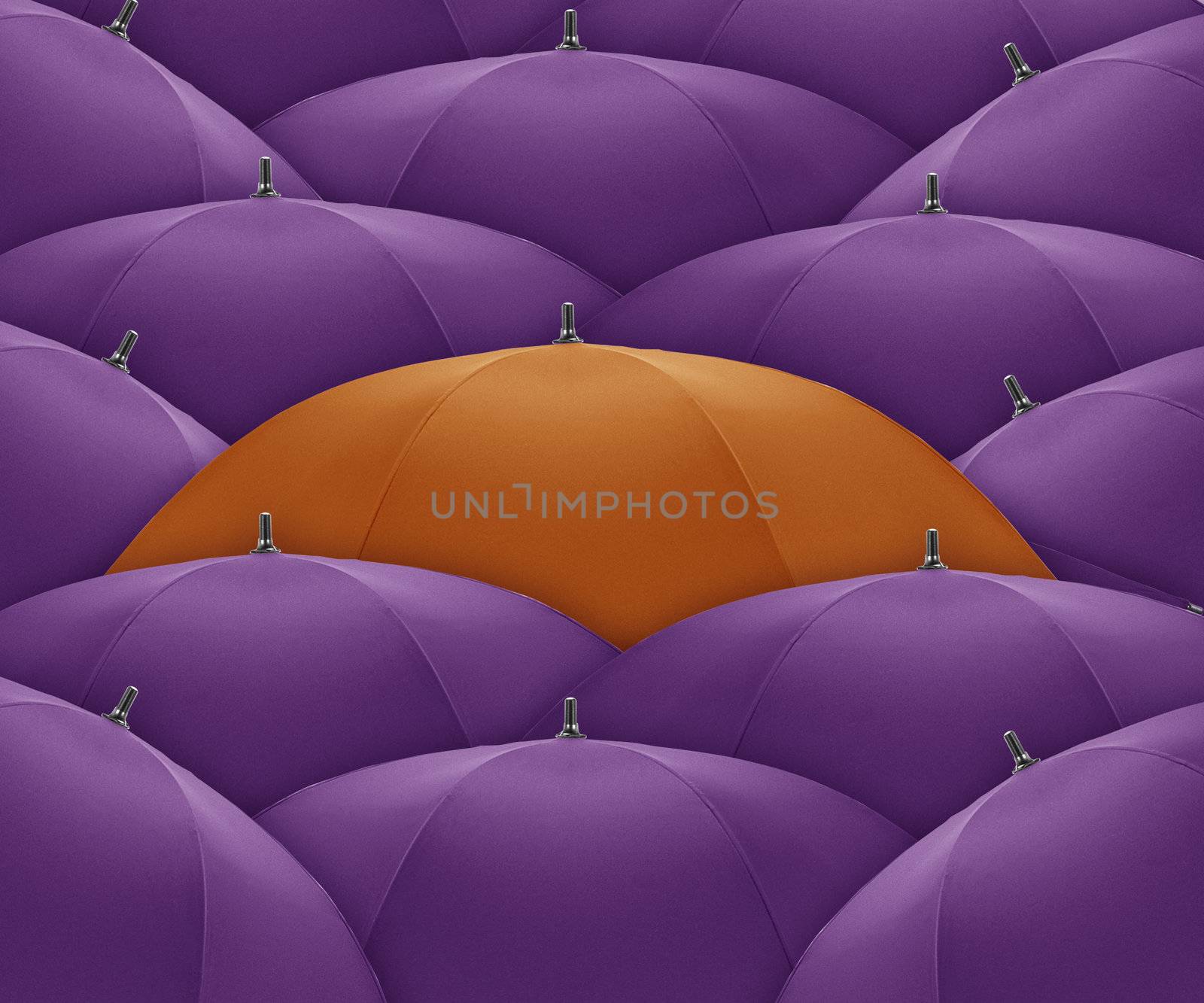 Orange umbrella Stand out of a crowd, individuality and unique