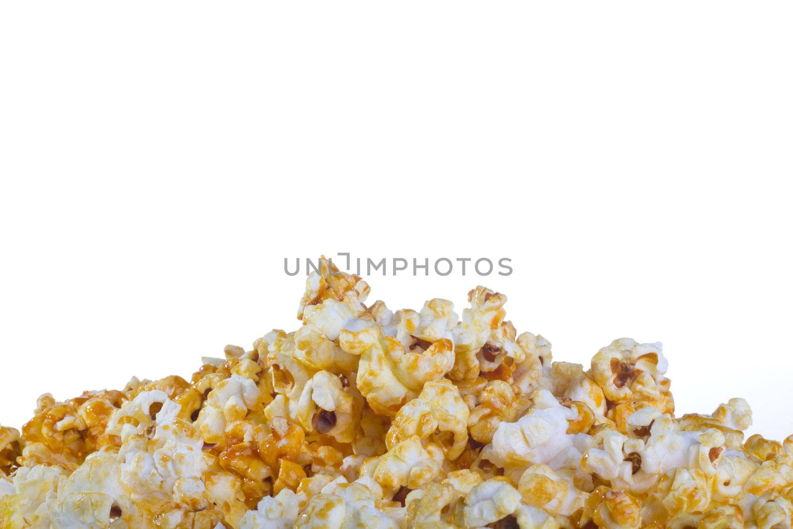 Bowl of popcorn isolated on white background by tehcheesiong