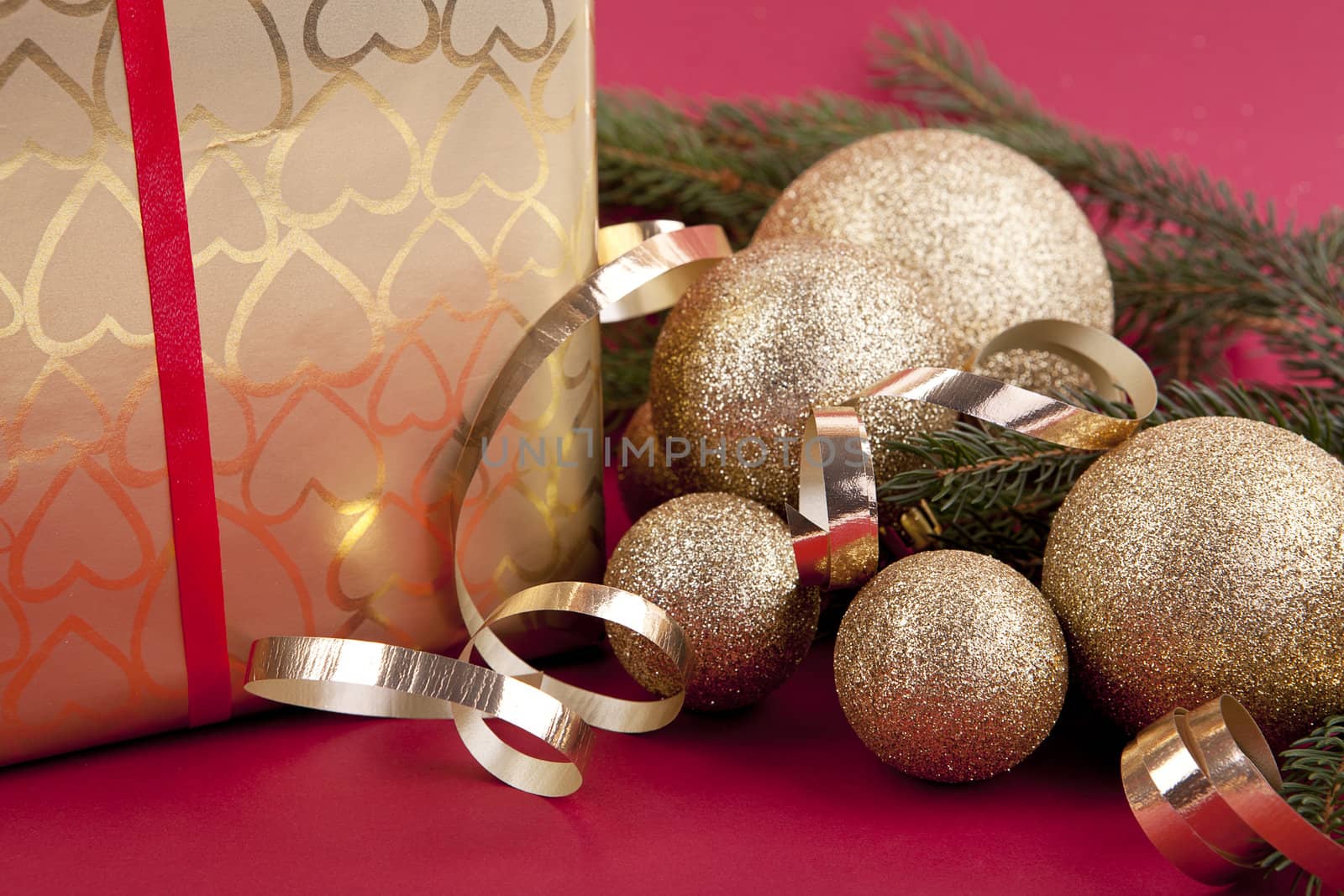 beautiful golden christmas decoration on red background sparkle