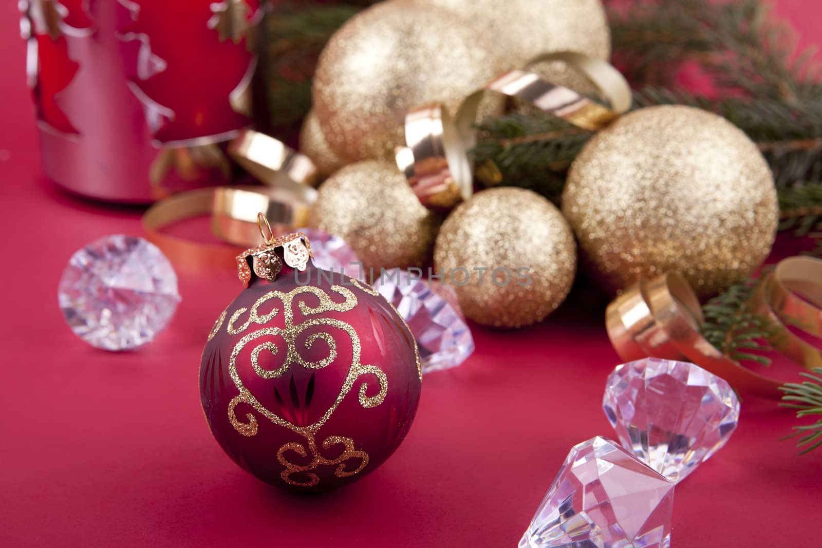 beautiful golden christmas decoration on red background sparkle