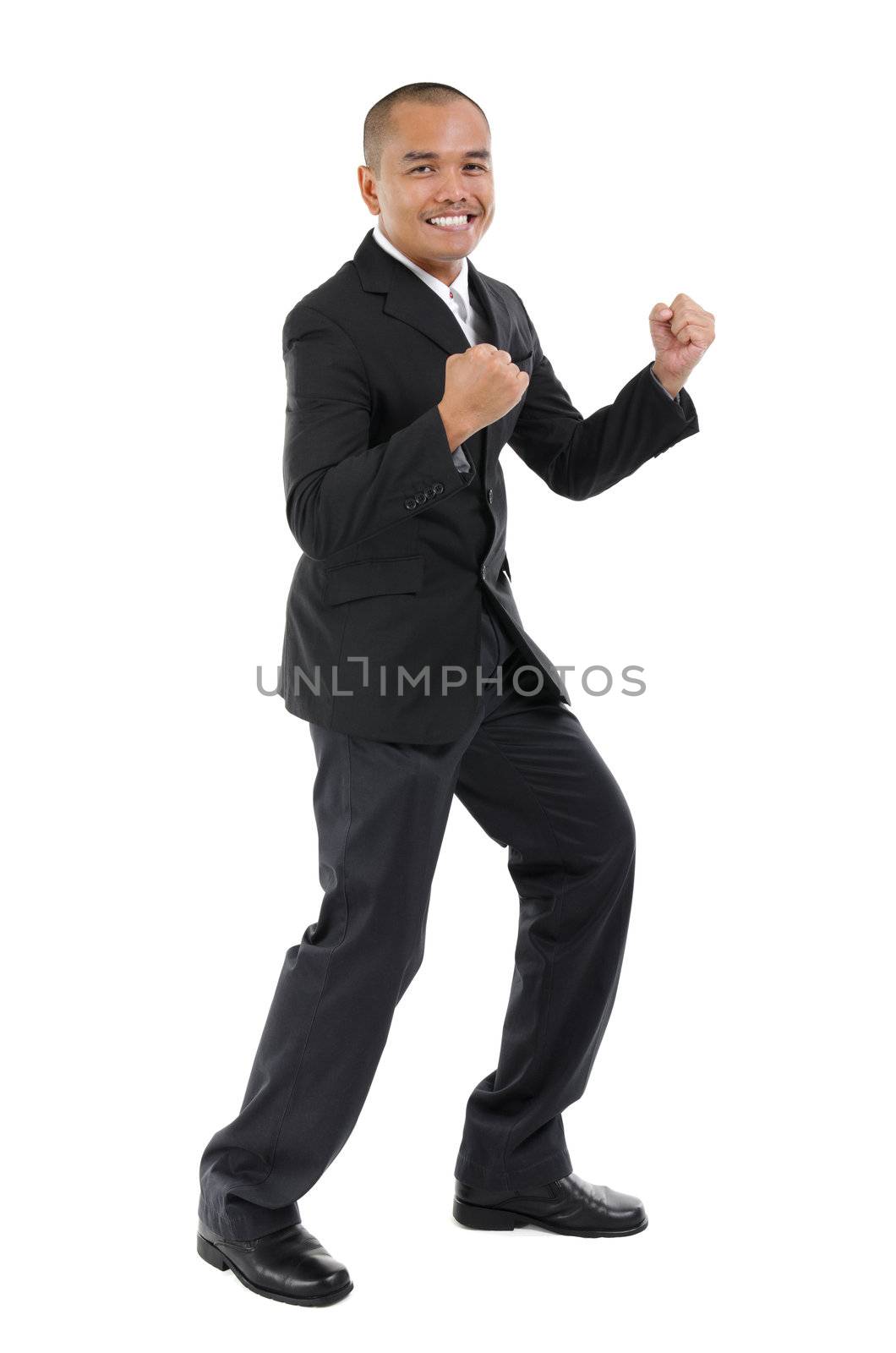 Excited Southeast Asian business man, fullbody over white background