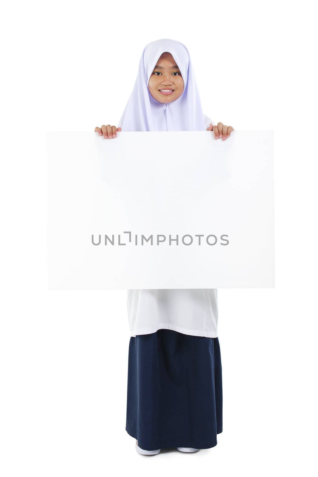 Fullbody Southeast Asian teen holding a blank card board over white background