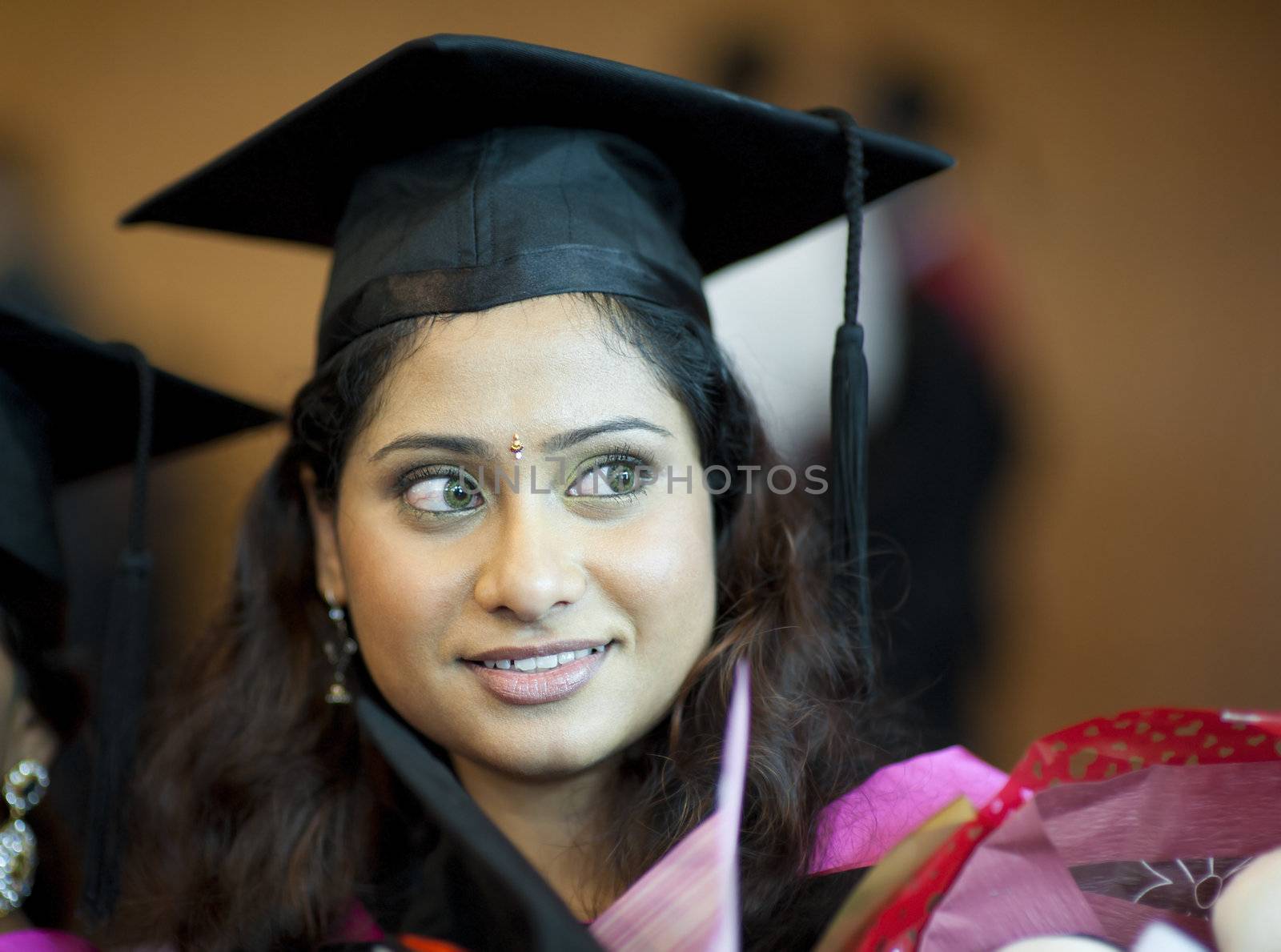 Happy Asian Indian female student in her graduation day