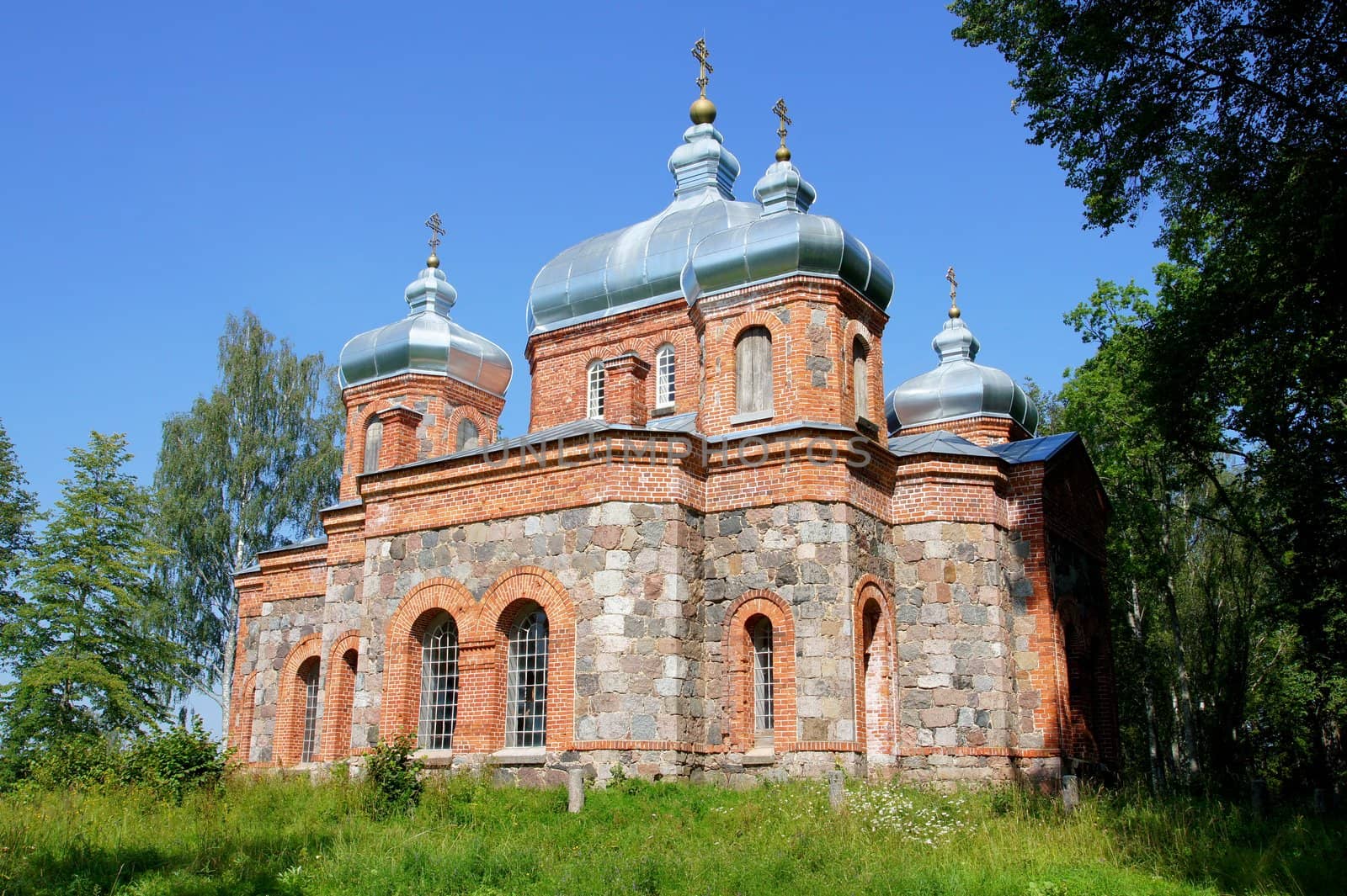 Estonia. Operating church on a background of the sky 