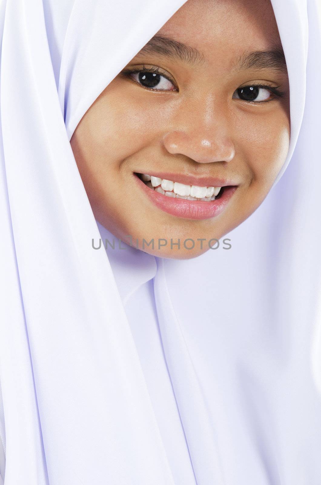 Twelve years old Southeast Asian Muslim girl portrait