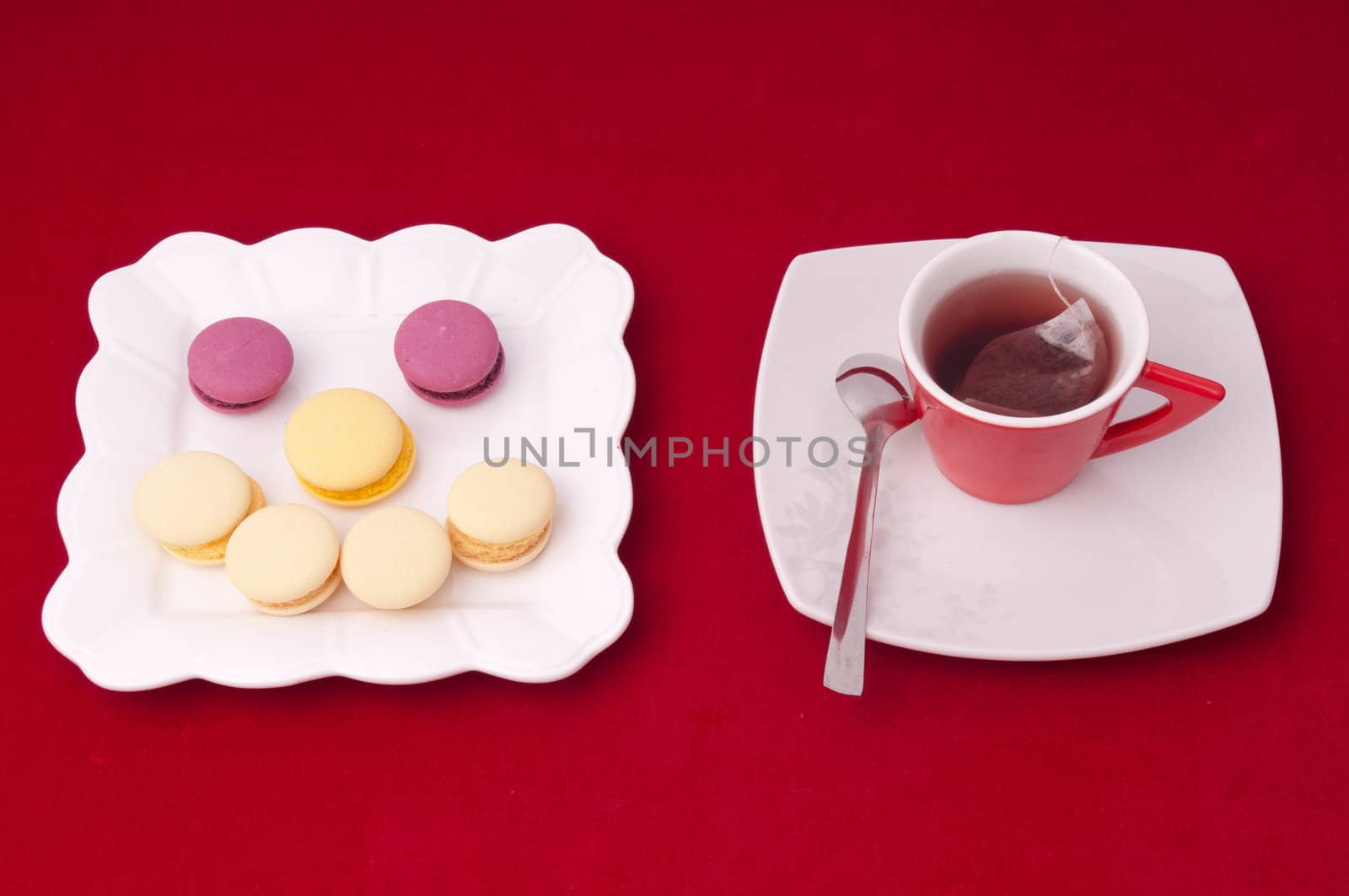 Cup of tea and smile of macaroons on a velvet tablecloth (3)