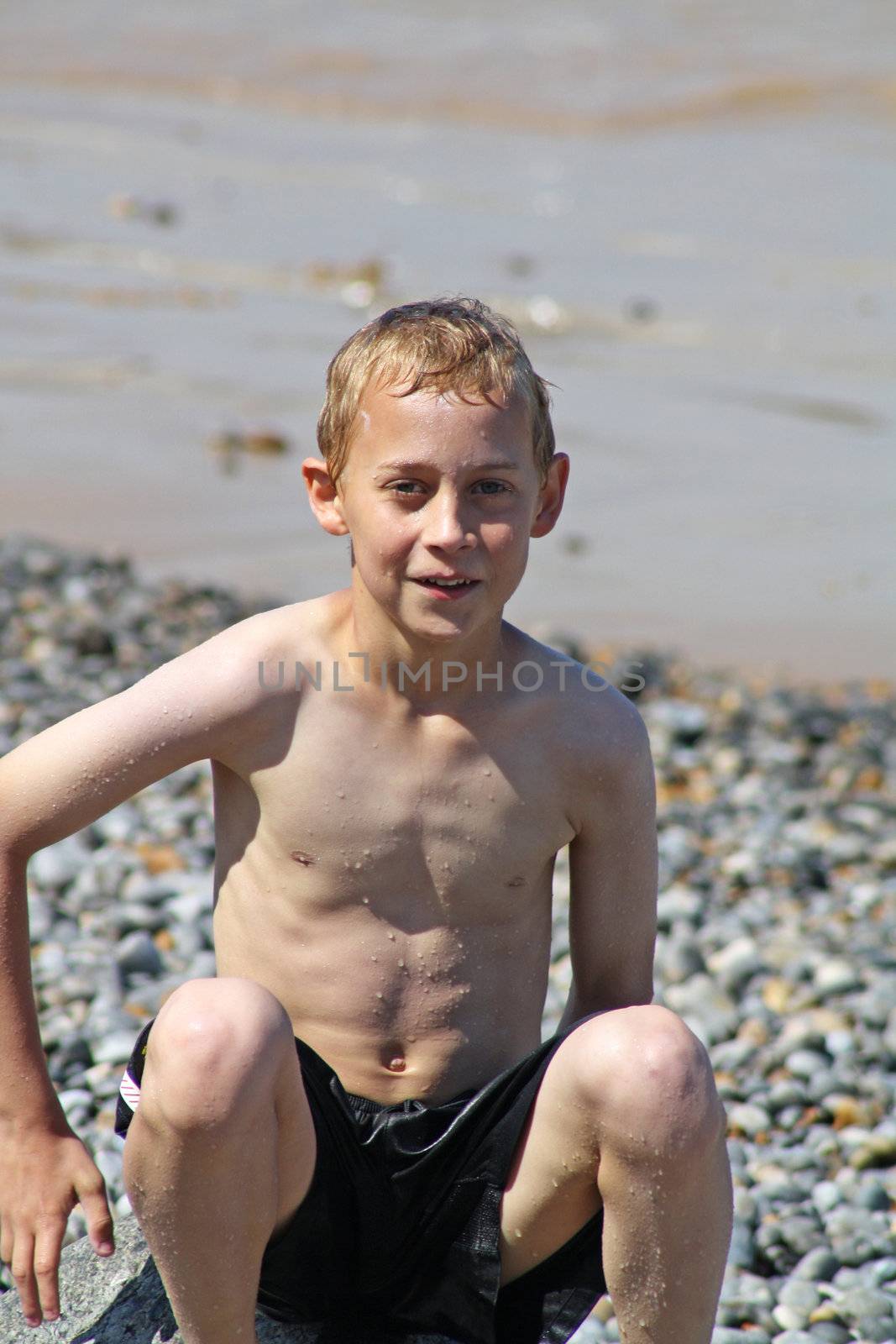 teenage boy in the sea