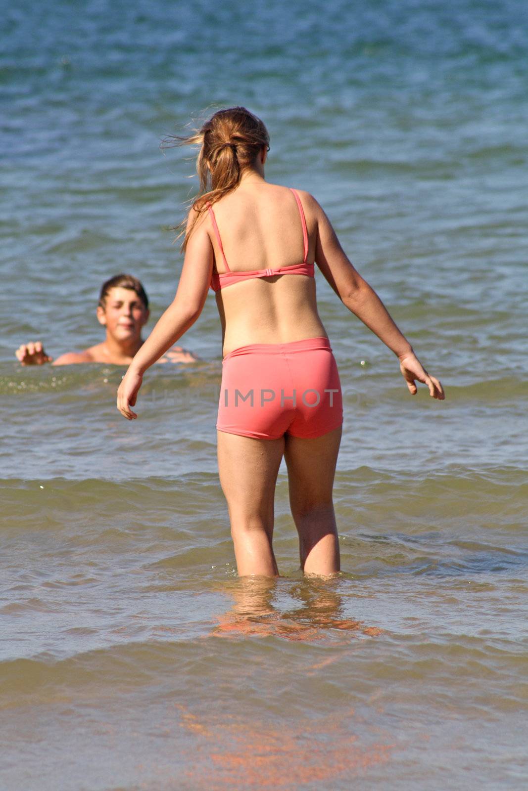 teenager in the sea at cromer england