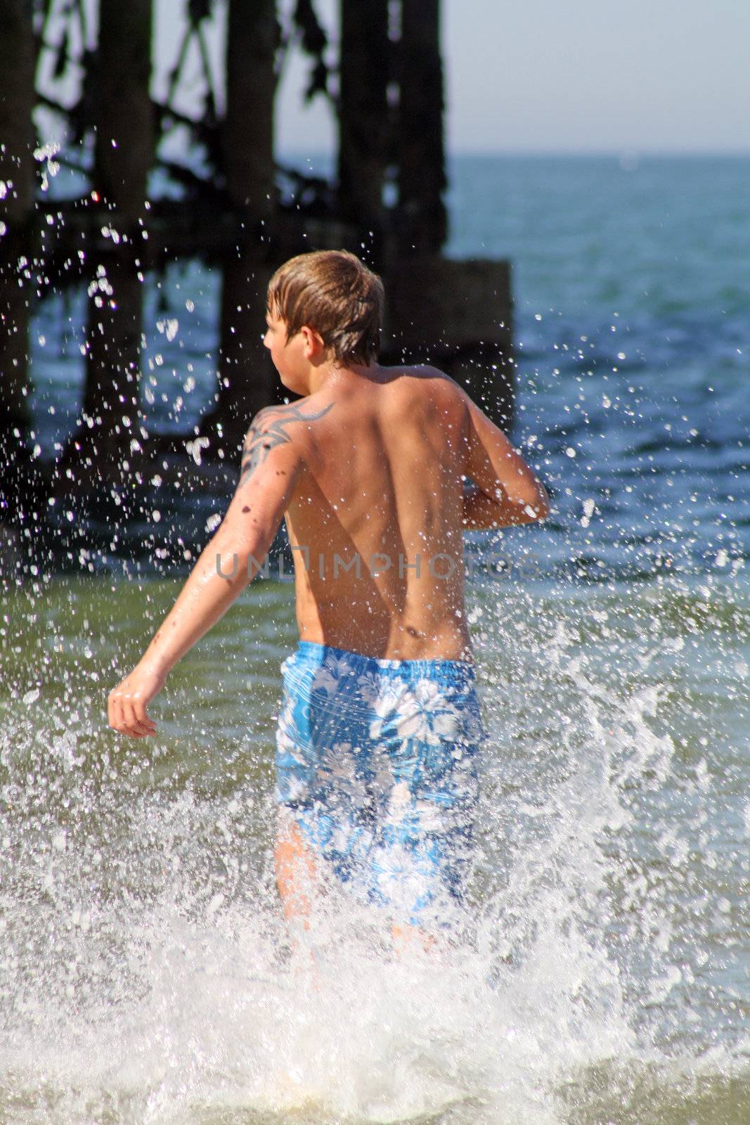 teenage boy in the sea