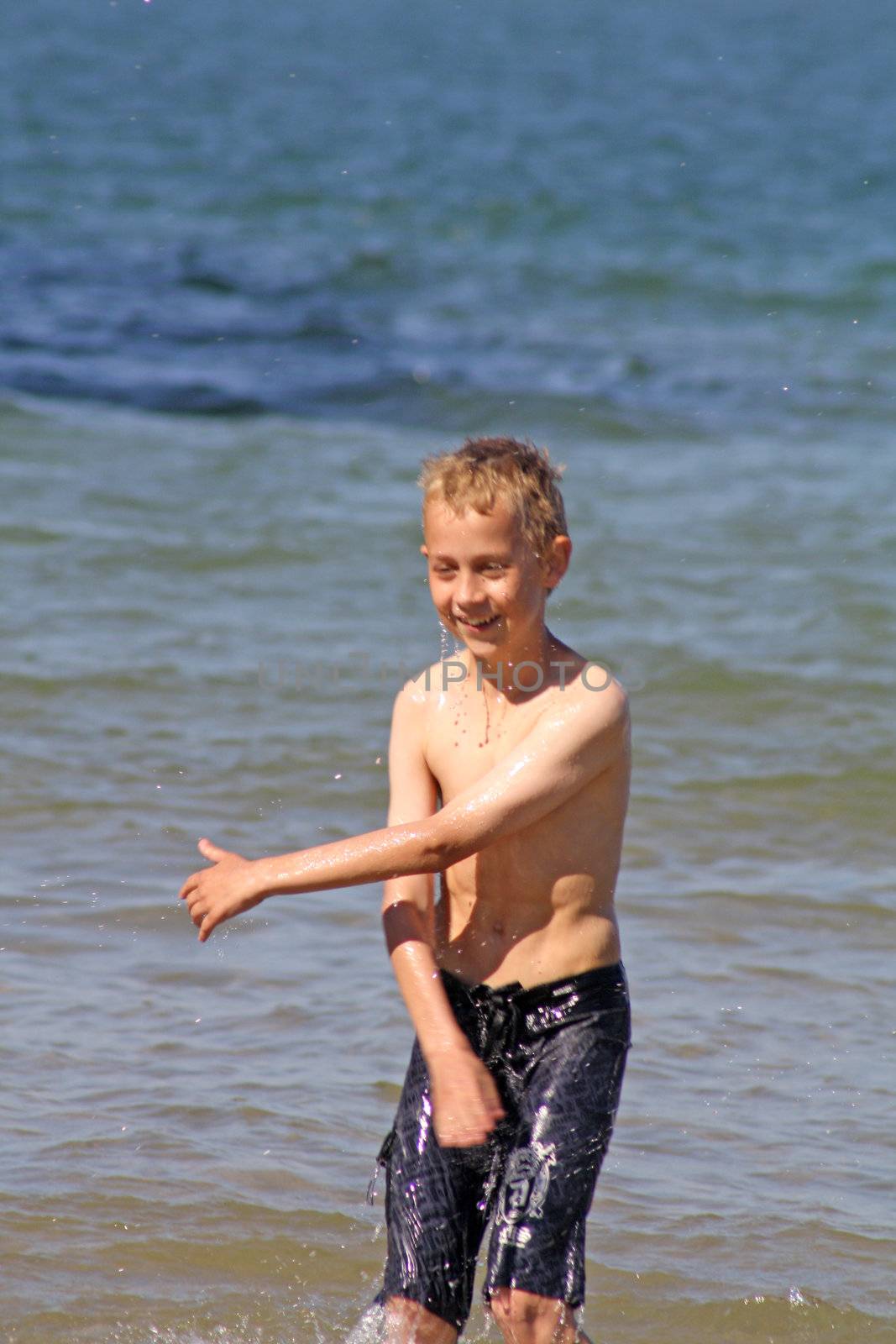 teenage boy in the sea